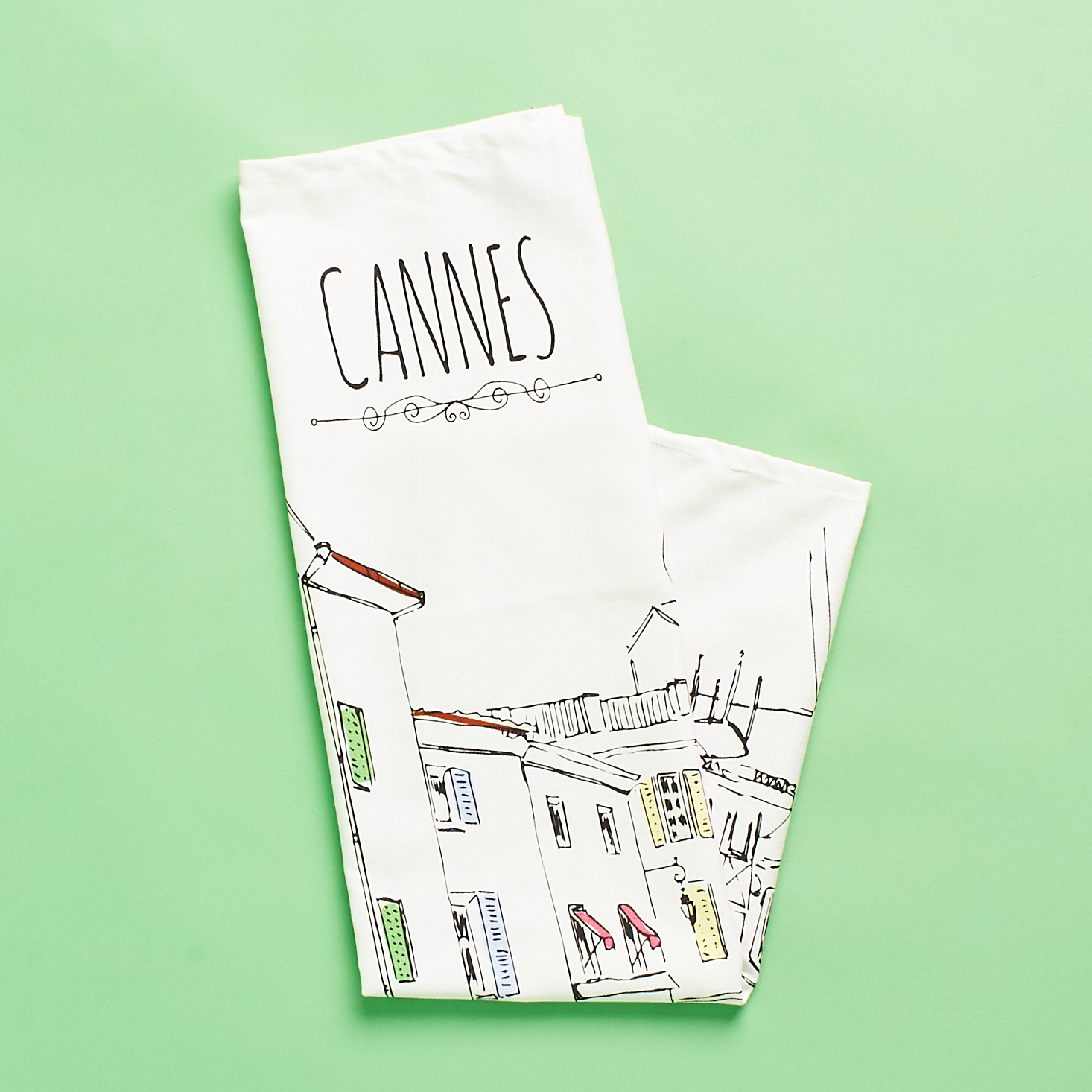 tea towel with cannes cafe illustration