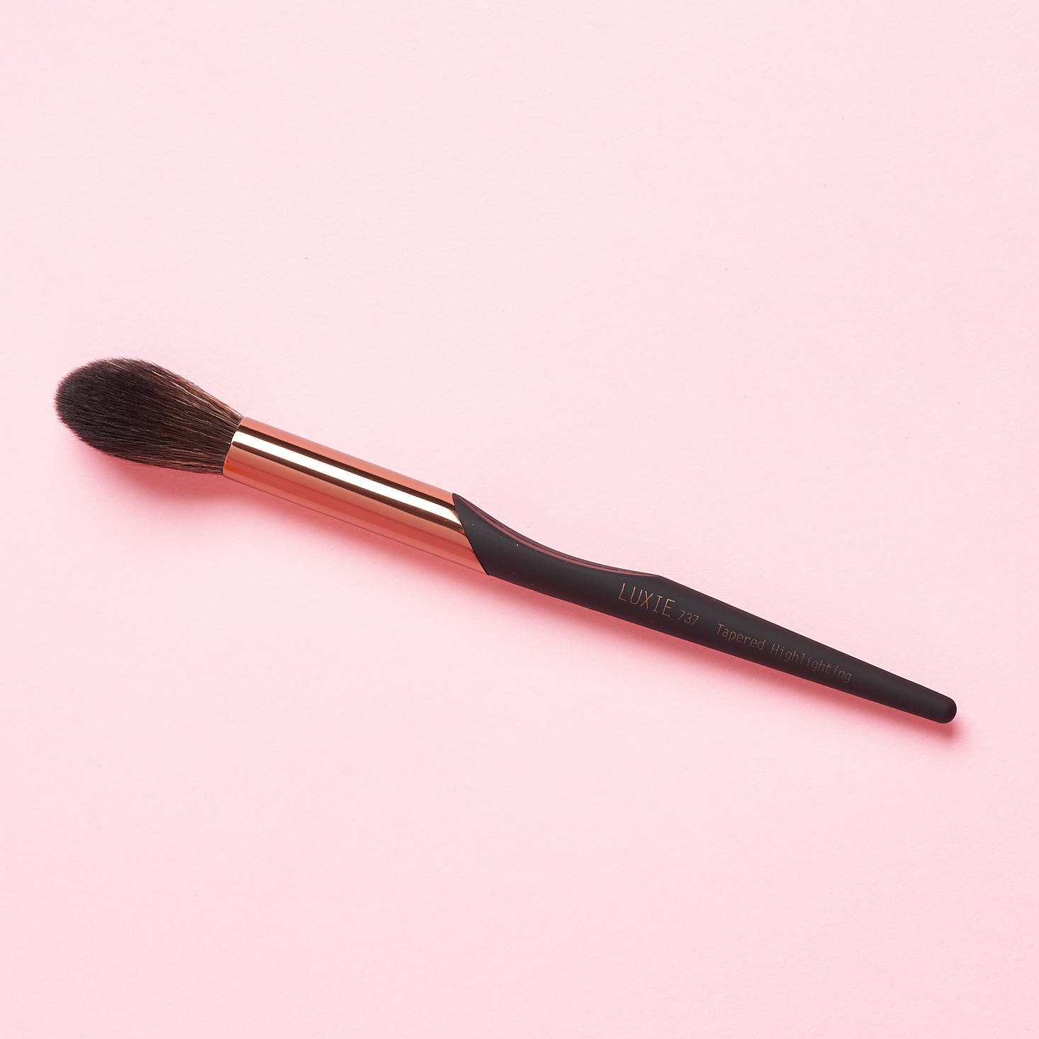 black handled powder brush