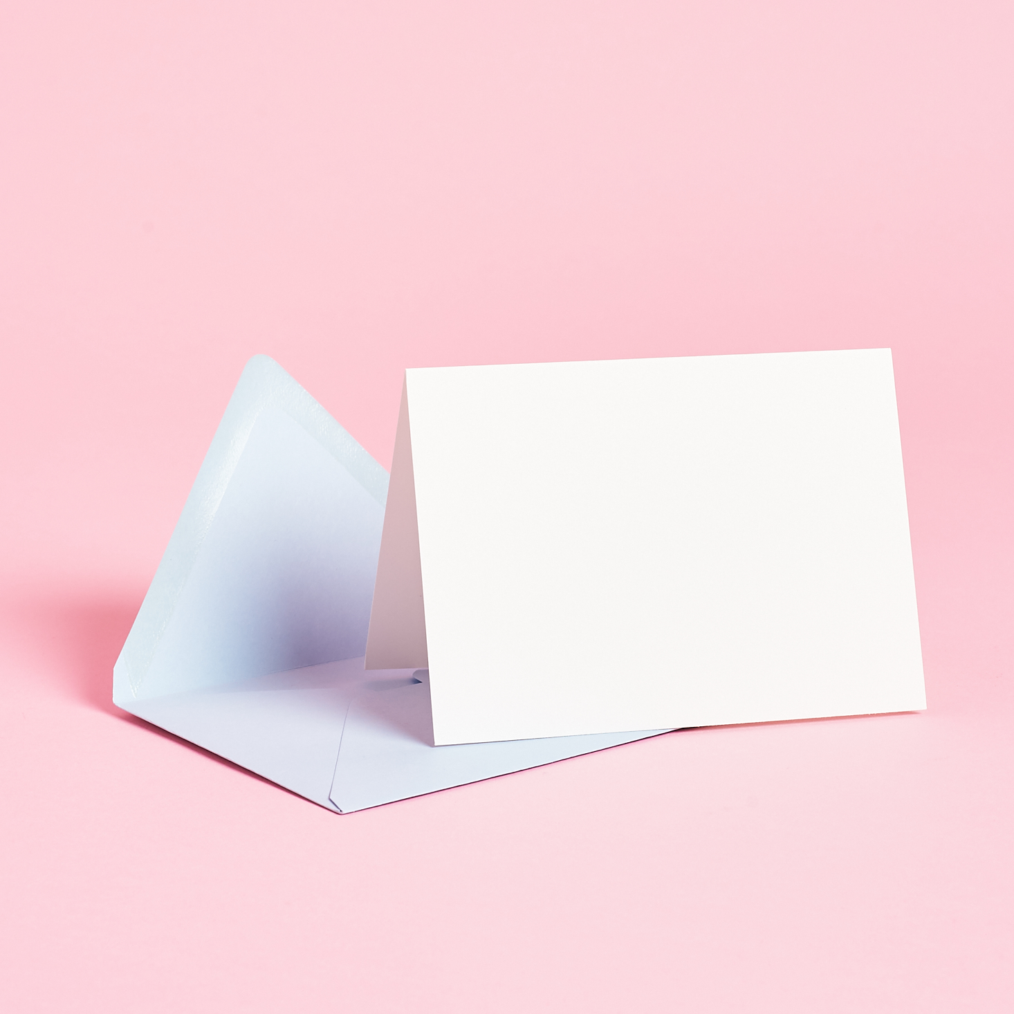a single Paper Source Colorful Note with light blue envelope