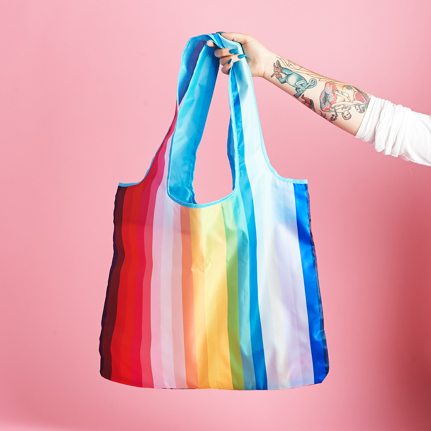 Marne holding the Paper Source Re-Usable Rainbow Tote