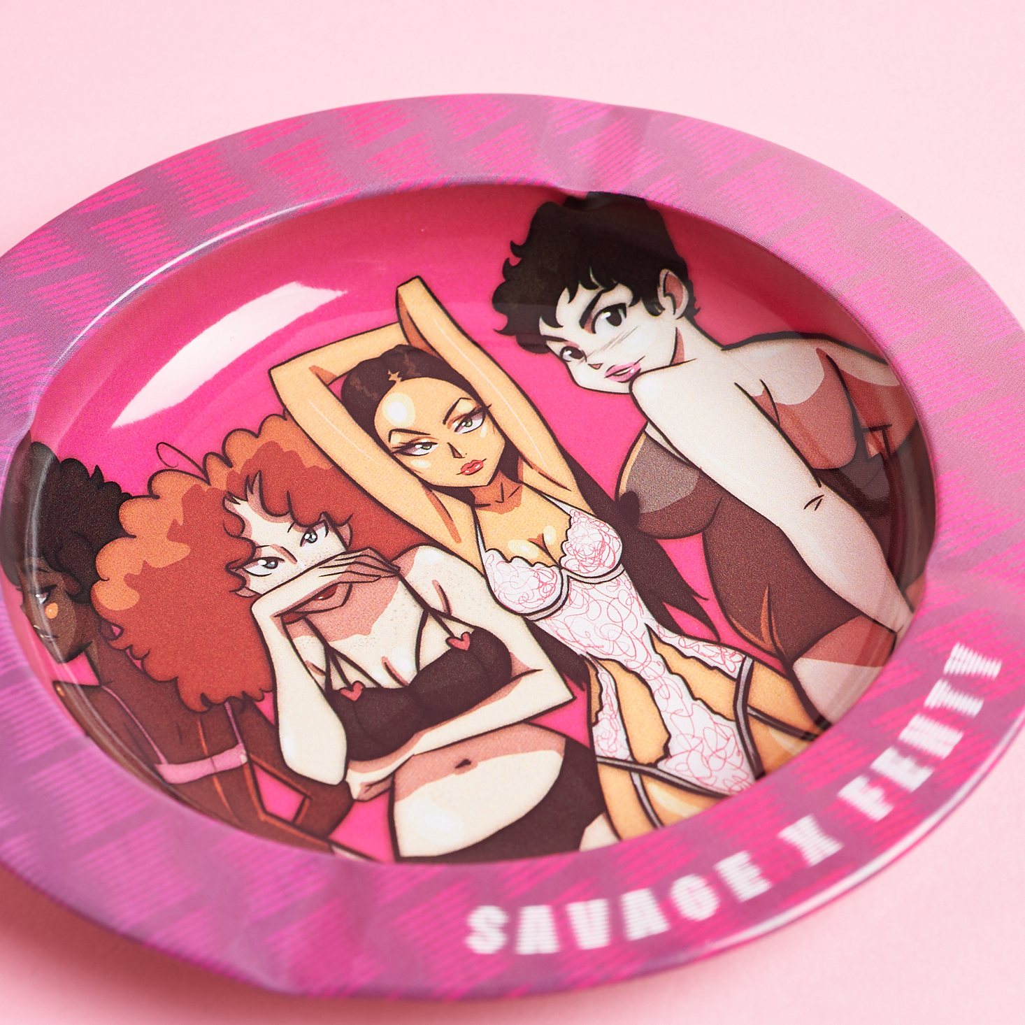 close up on the three sexy cartoon models on my savage fenty ashtray