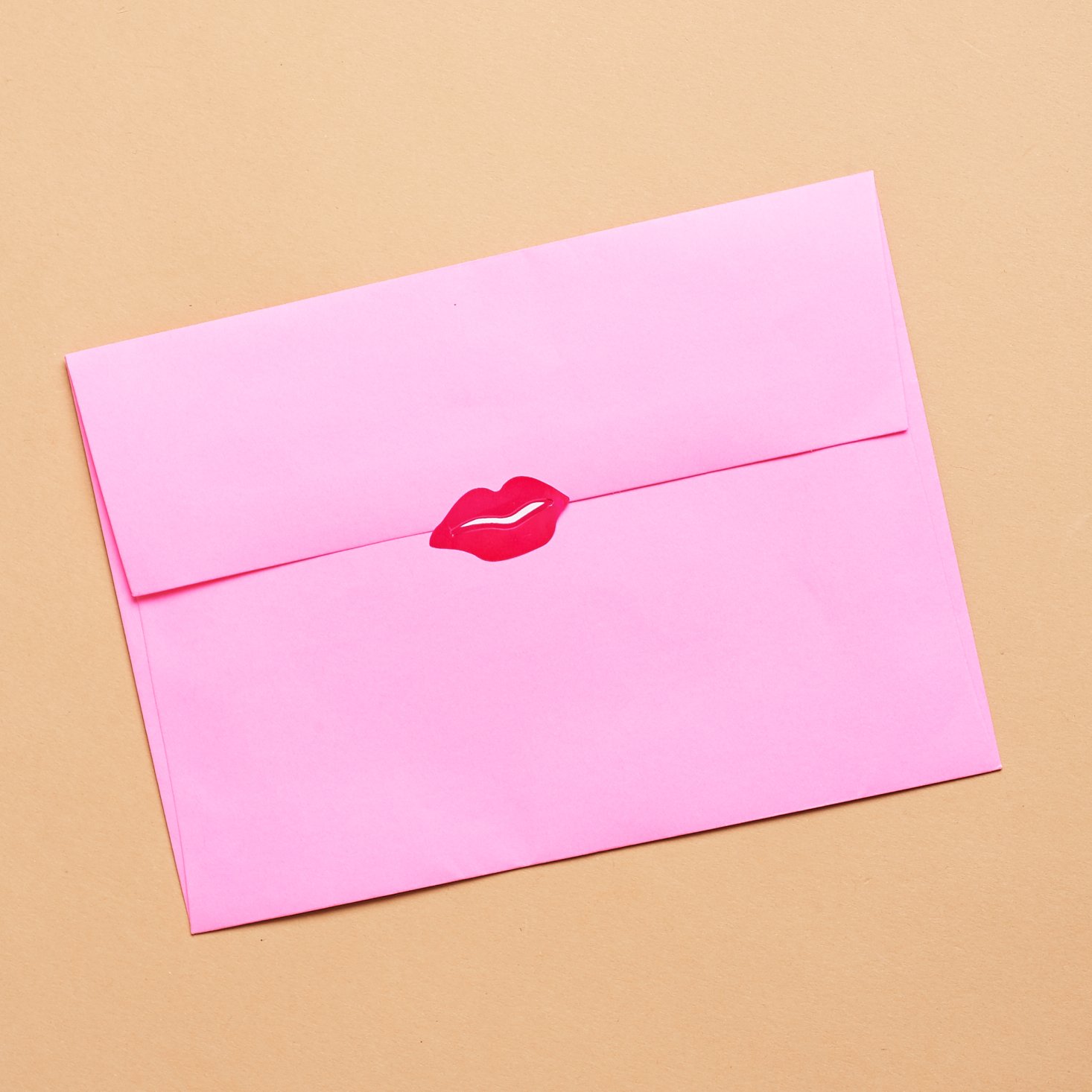 Pink envelope with lips sticker