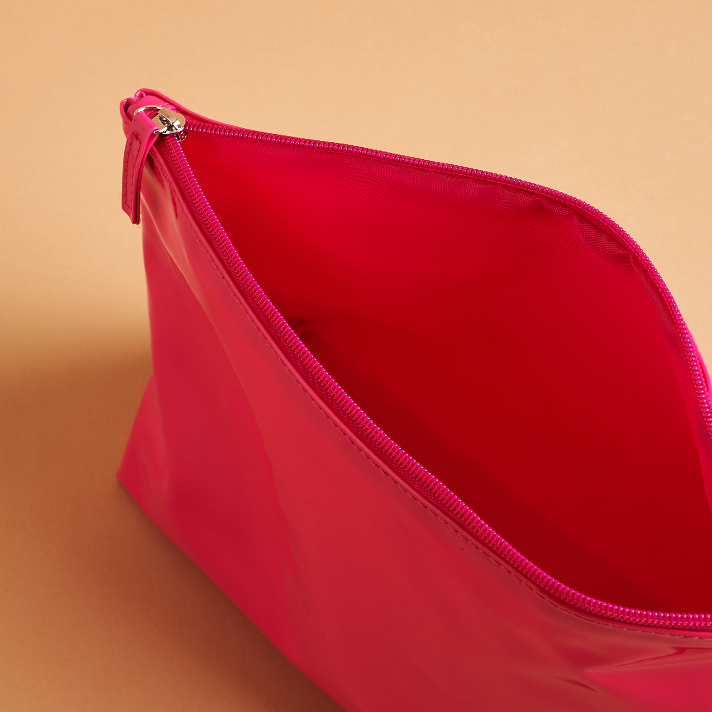 looking into opened Glossy Pink SlutBox Makeup Bag