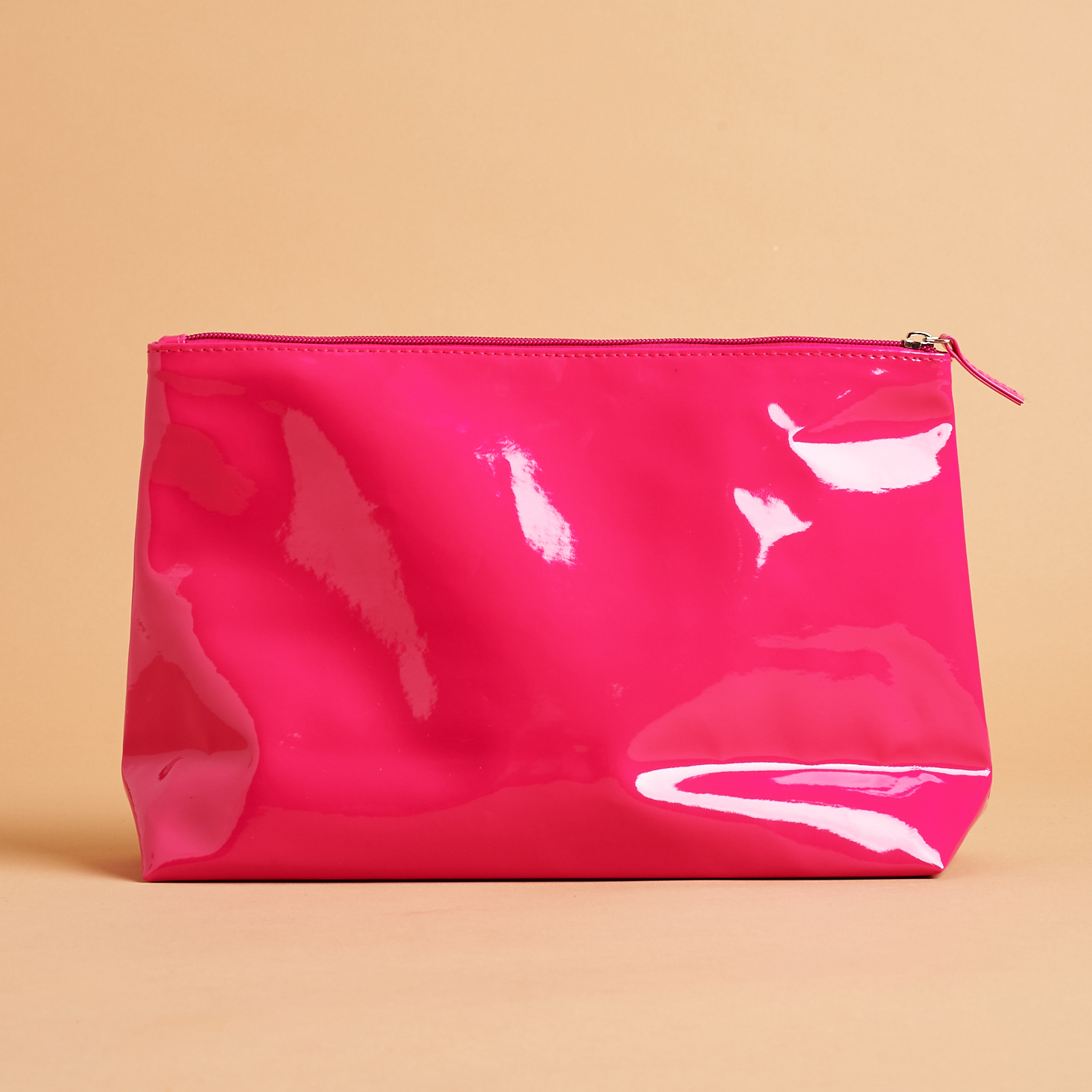 other side of Glossy Pink SlutBox Makeup Bag upright