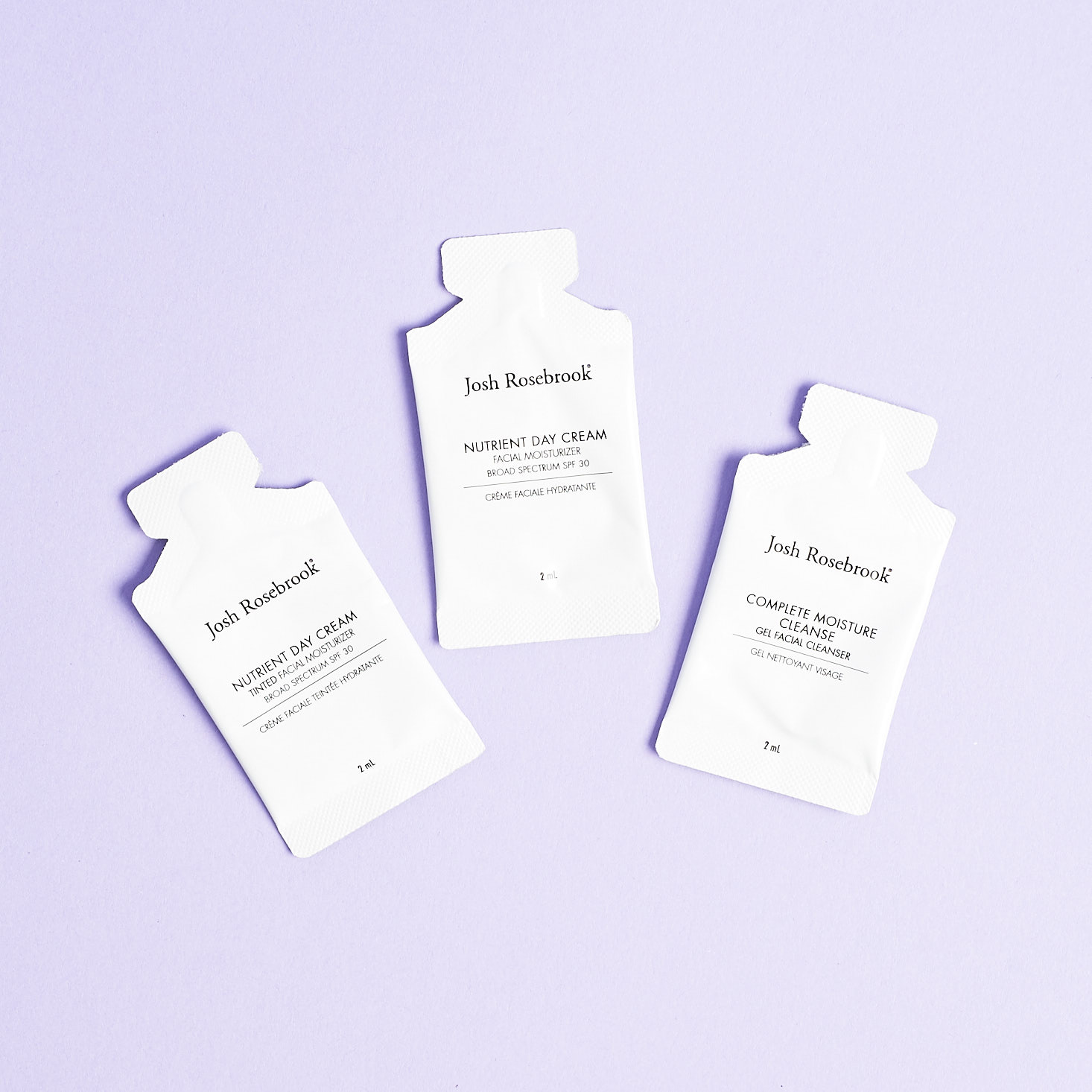 Three Josh Rosebrook sample sachets in a group