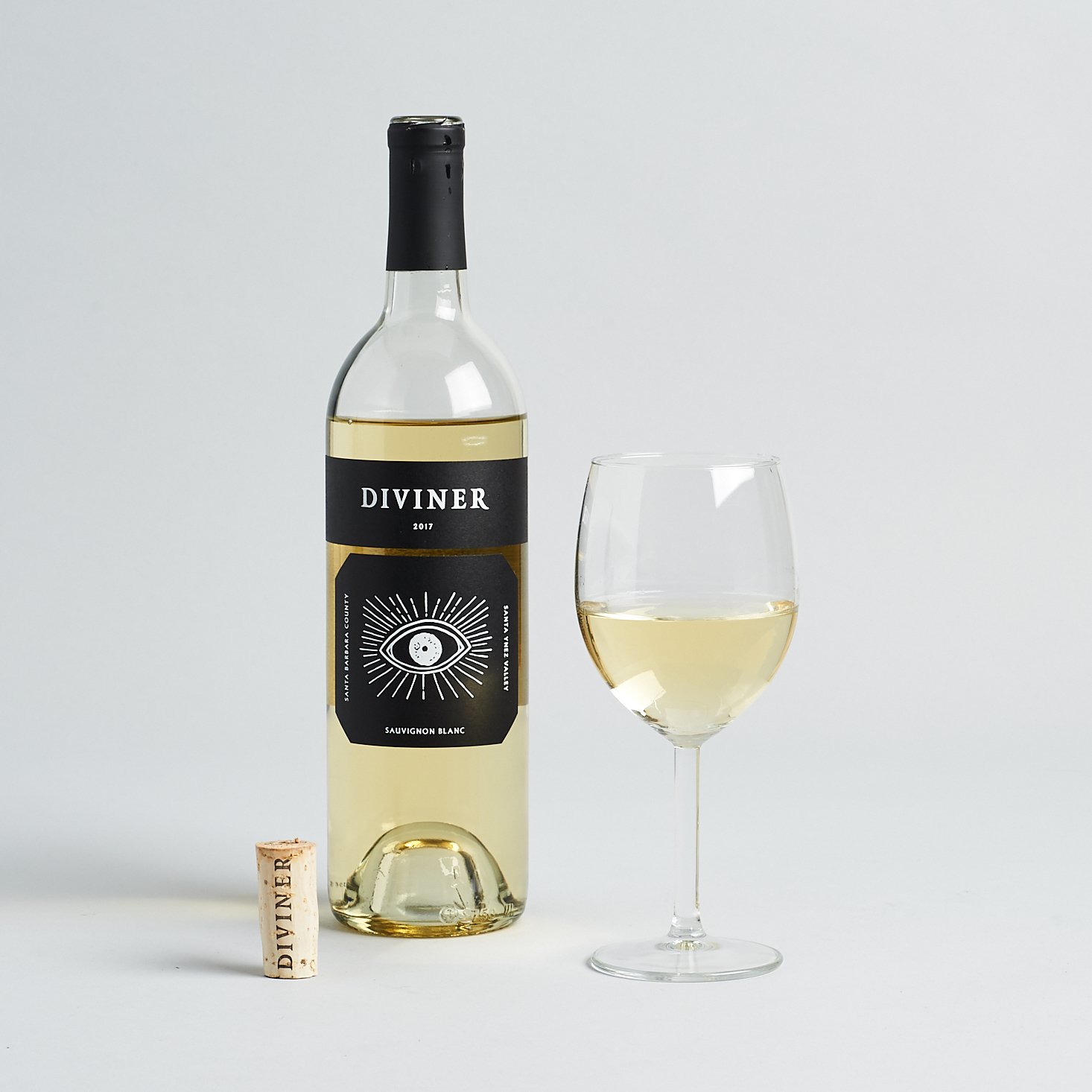 diviner sauvignon blanc open bottle and glass with cork