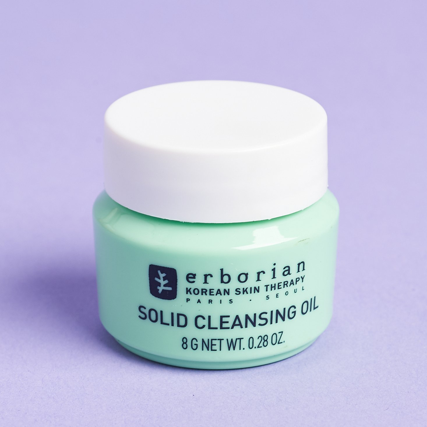 mint and white tub of balm cleanser