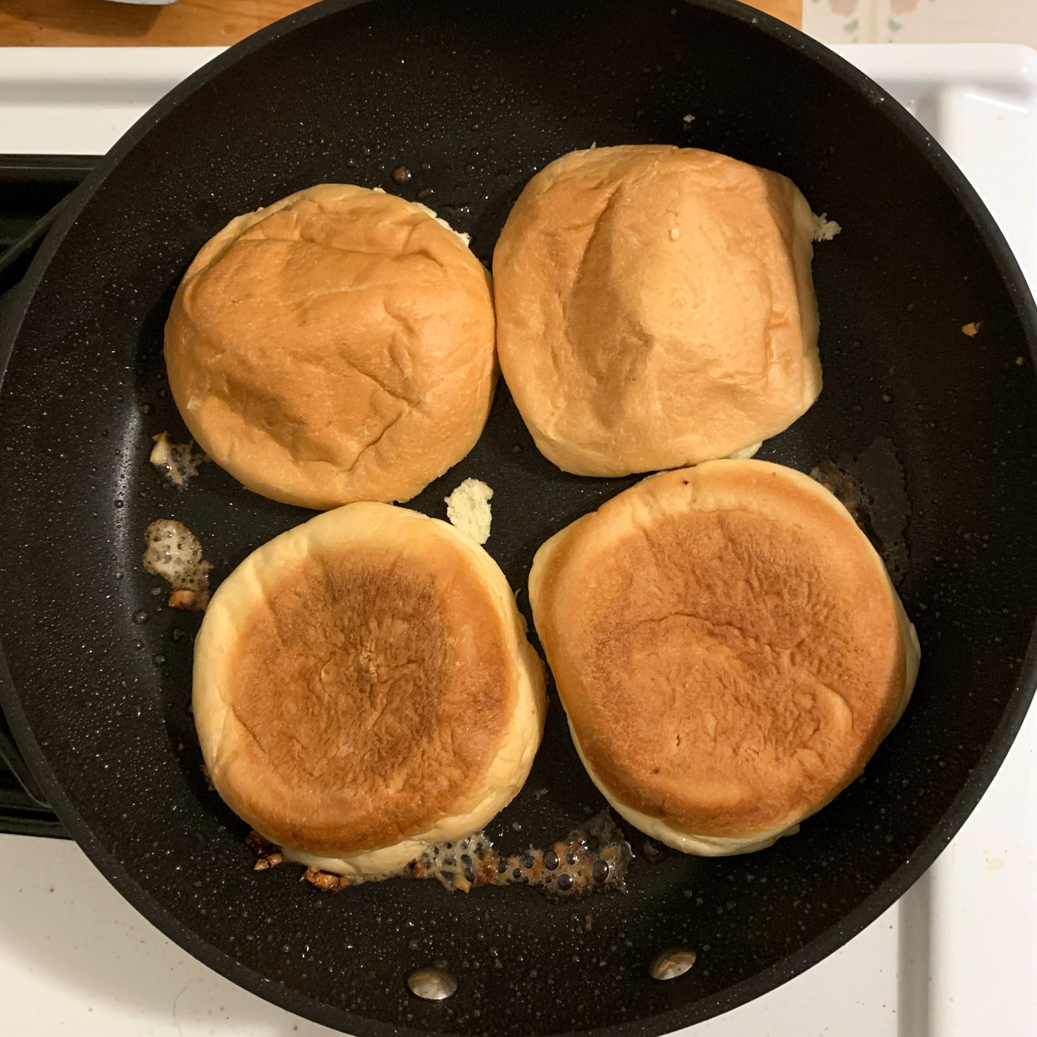 Buns toasting in pan