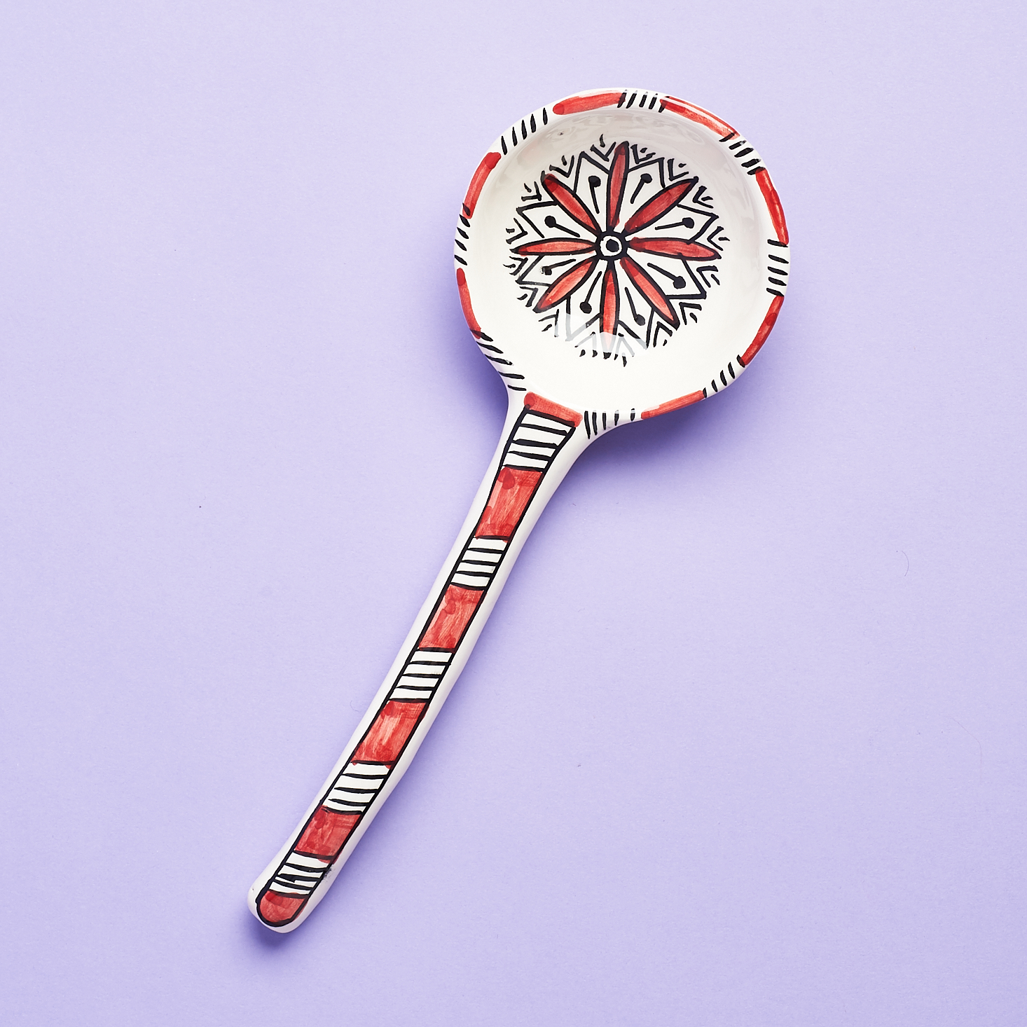 red and white sauce spoon