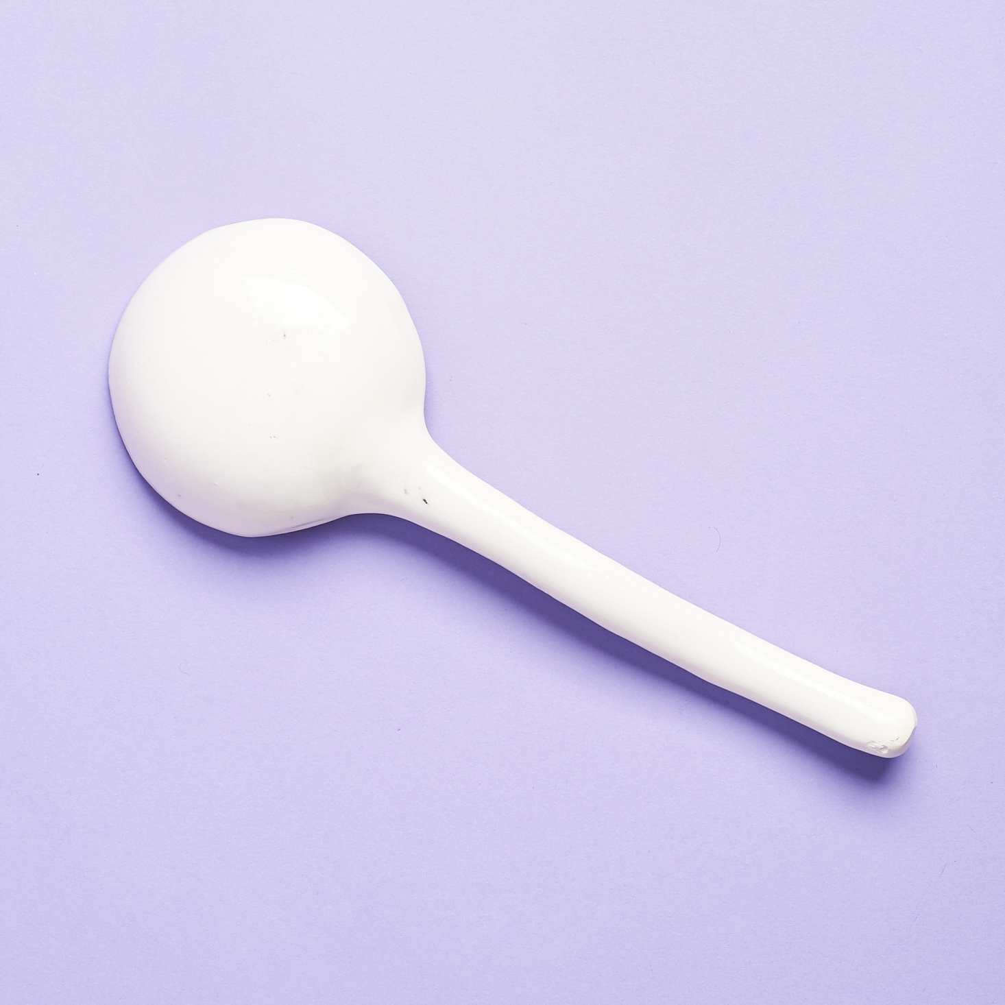 white backside of ceramic spoon