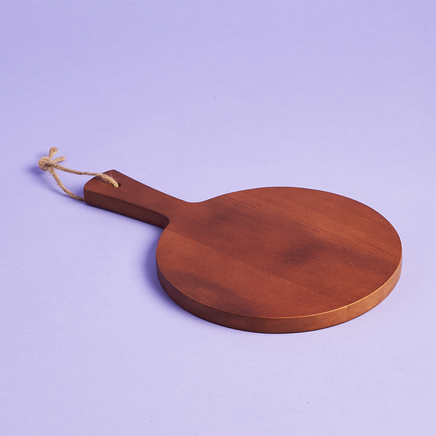 round wooden board with handle