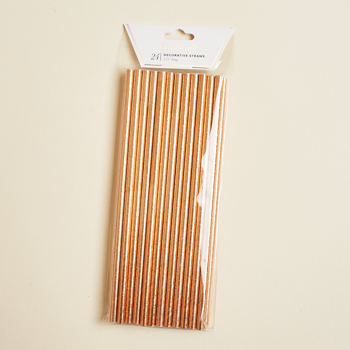 rose gold paper straws in clear packaging