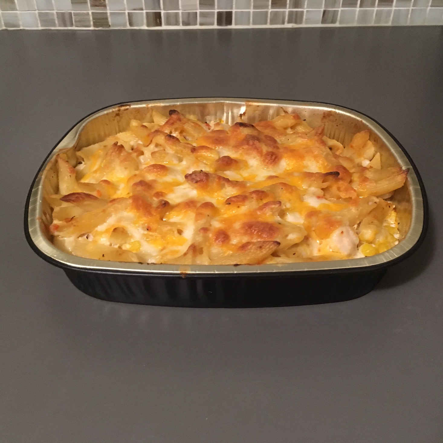 chipotle chicken alfredo baked penne after baking side view