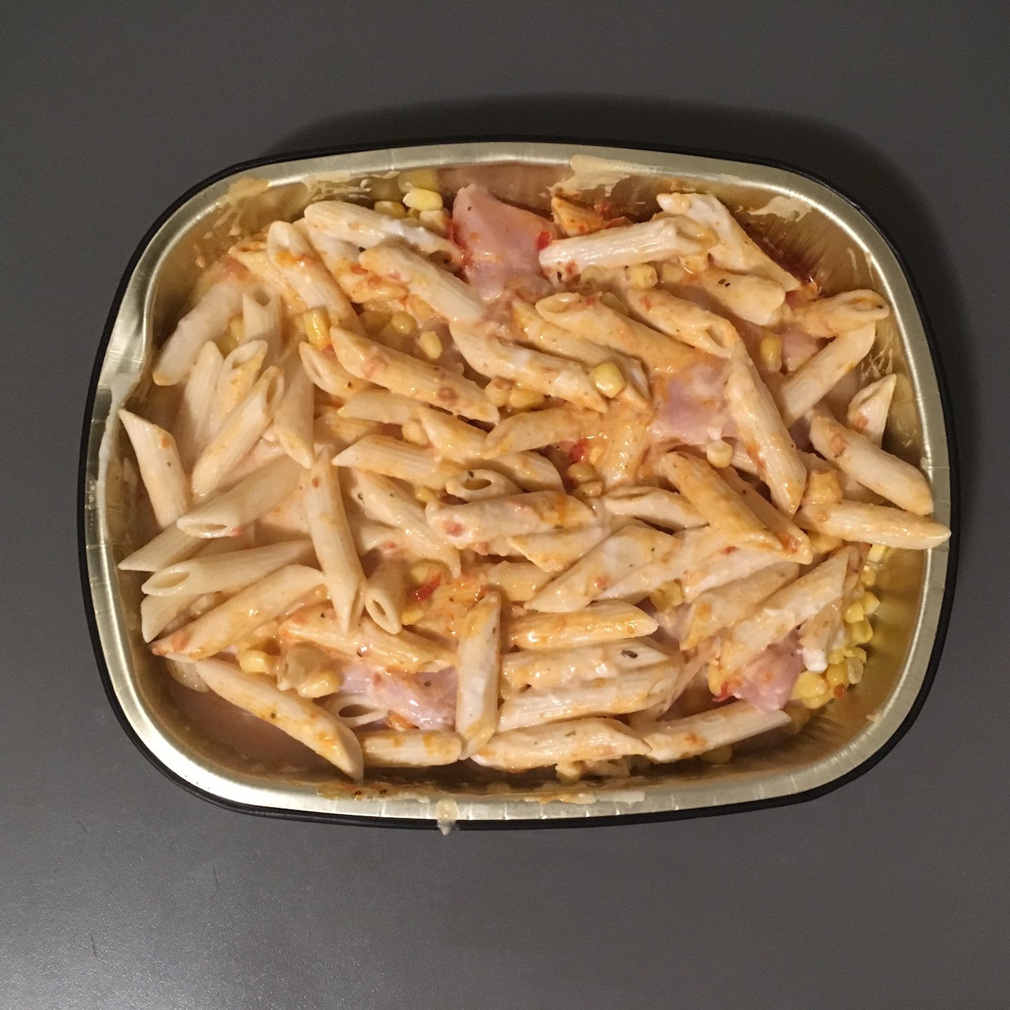 chipotle chicken alfredo baked penne ingredients mixed in pan