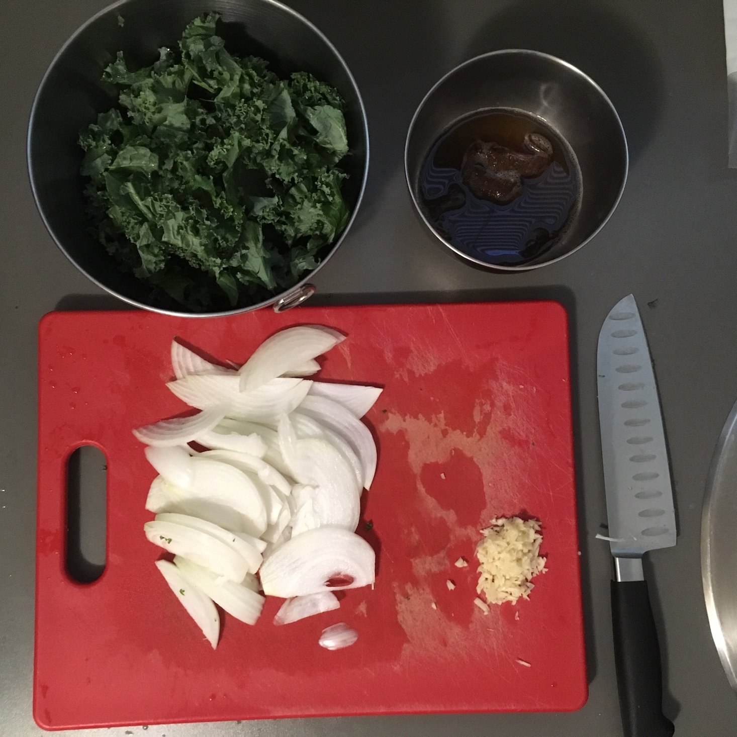 kale caesar flabtread prep work with porcinis in water