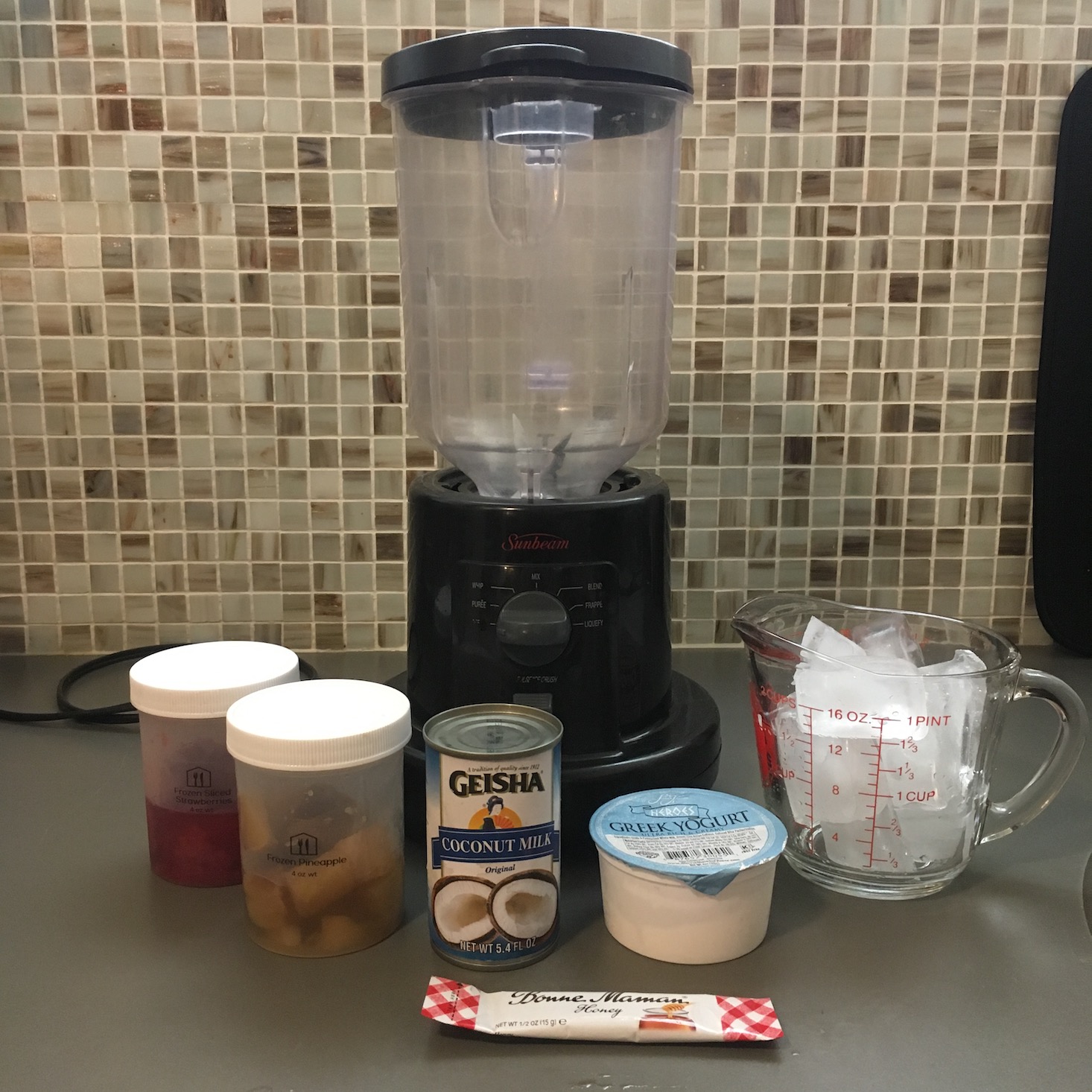 strawberry colada smoothie all contents on counter