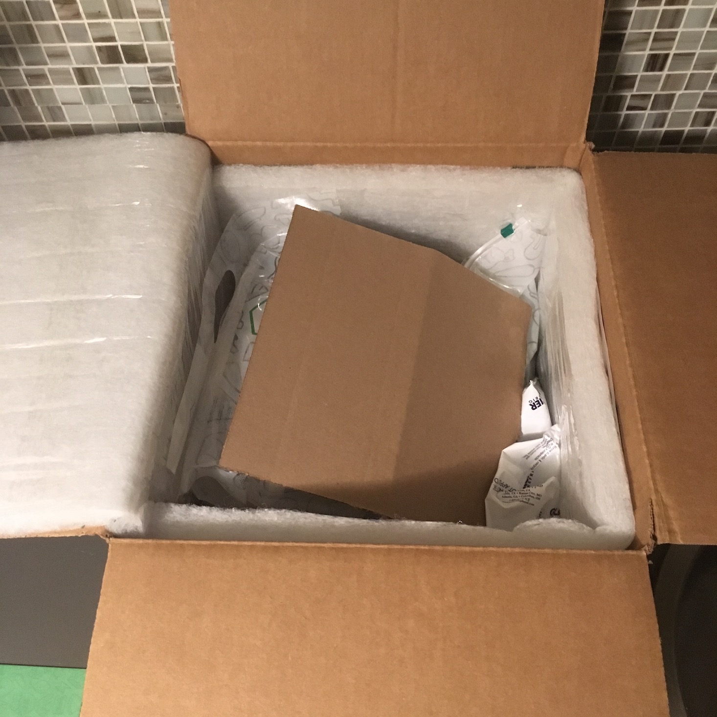 top interior view of box and cardboard divider