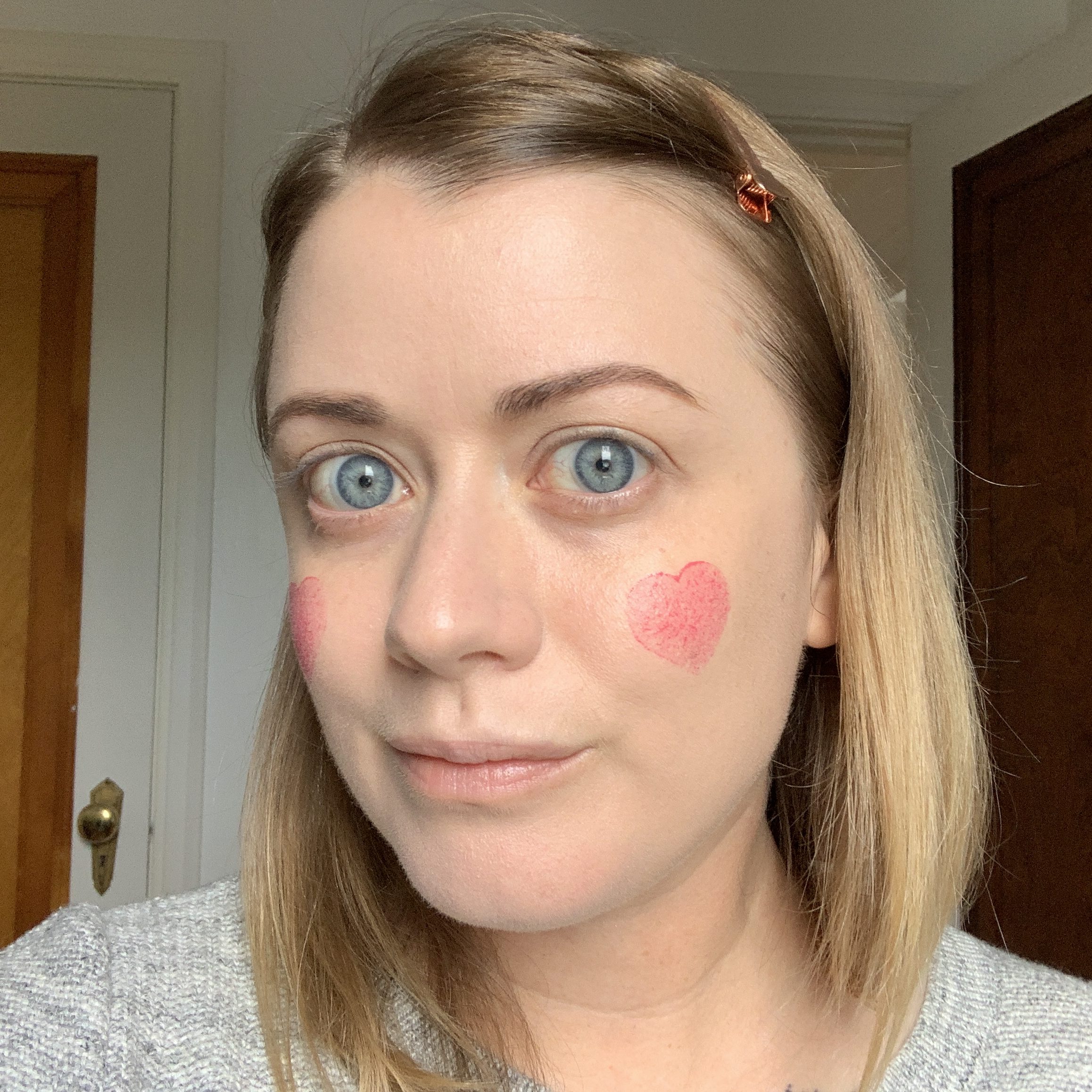 Marne with heart stamp blush on cheeks