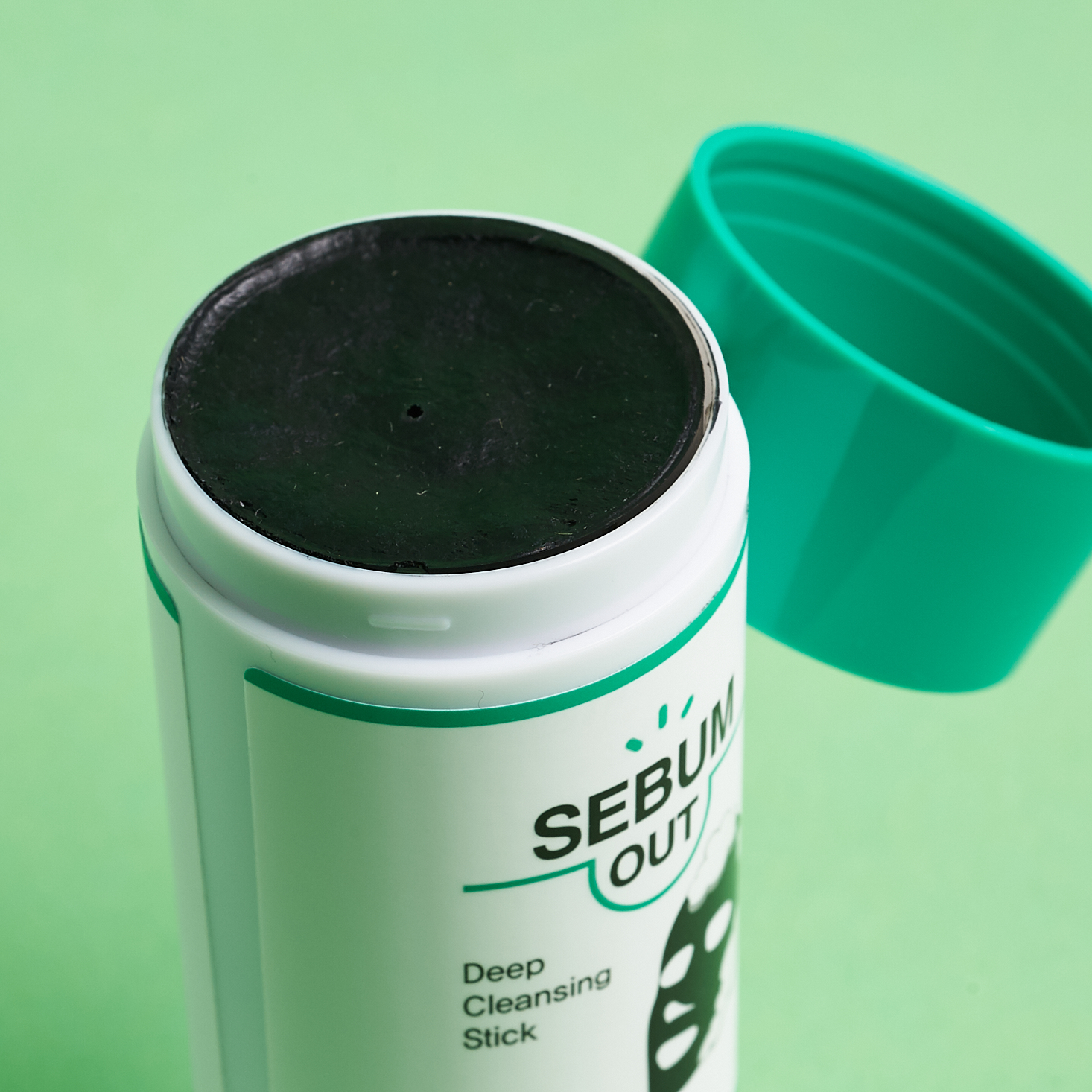 close up of charcoal end of W. Lab Sebum Out Cleansing Stick