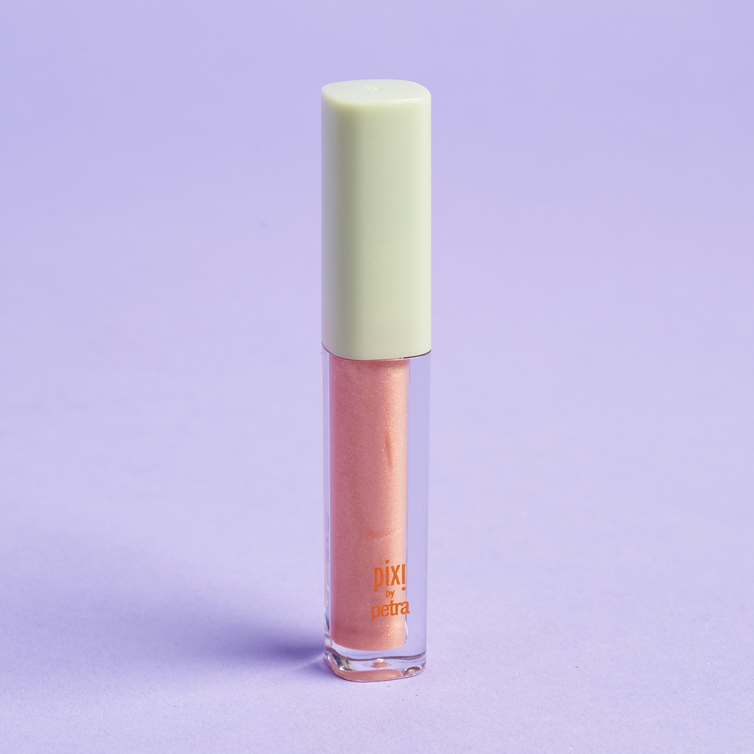 clear mini lipgloss tube with mint green top