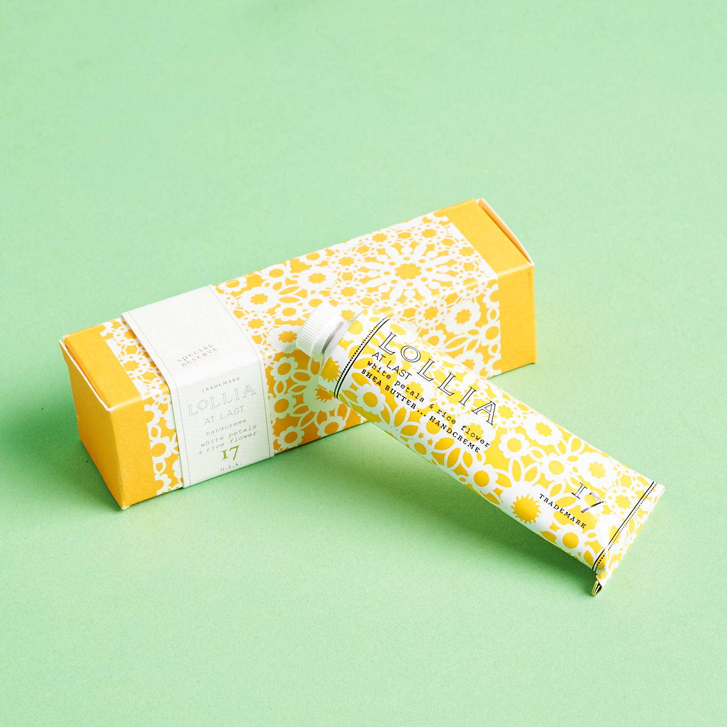 yellow and white mini tube of hand cream