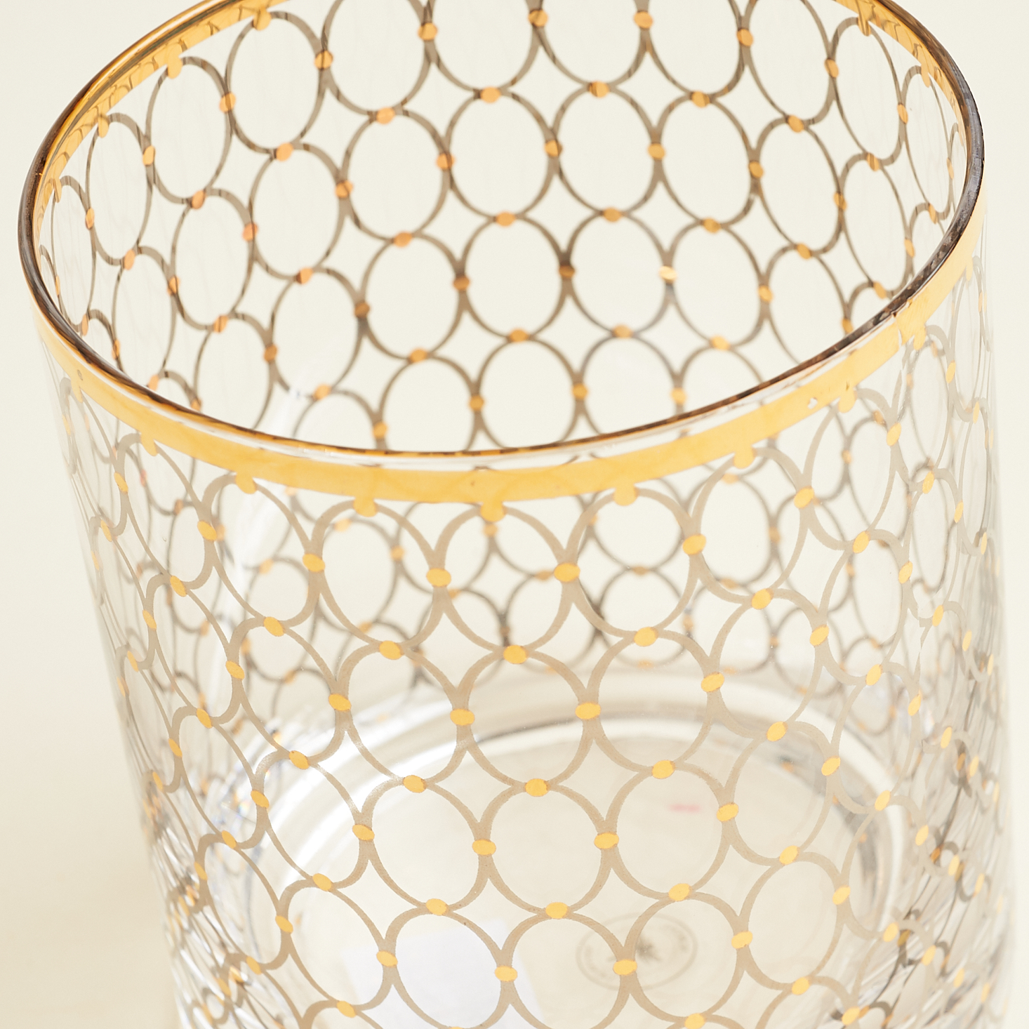 close up of Nordal gold patterned glass