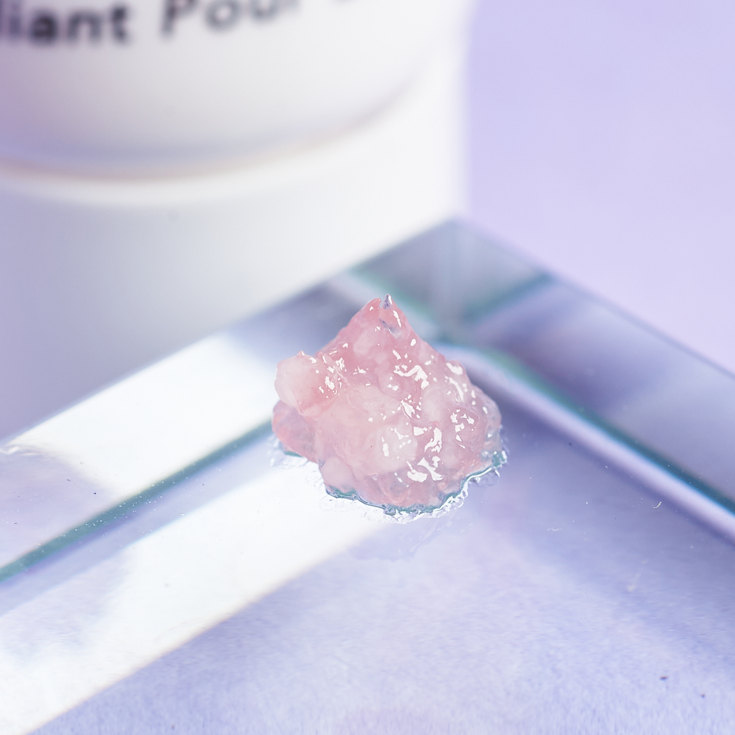 pale pink colored gel scrub on glass