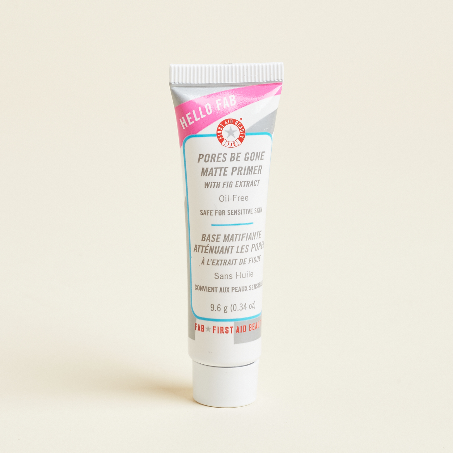 tube of primer with pink, red, blue, and silver design