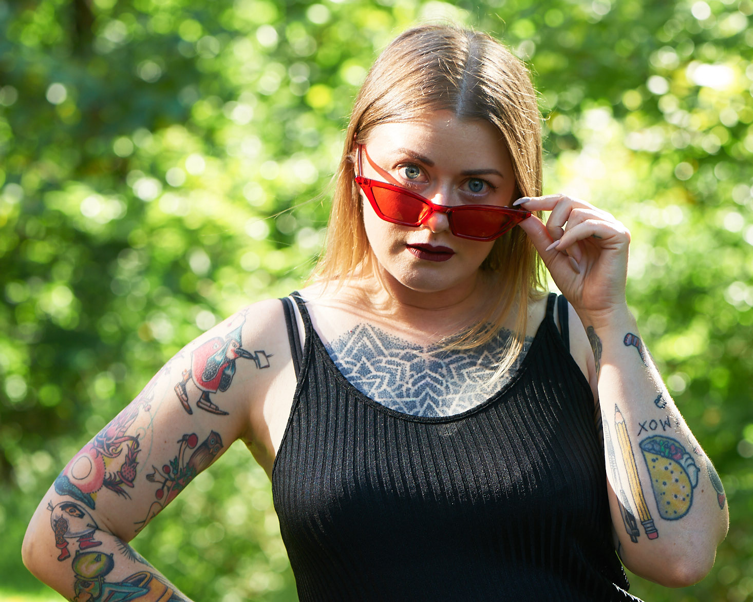 Marne wearing lipstick and sunglasses from SlutBox