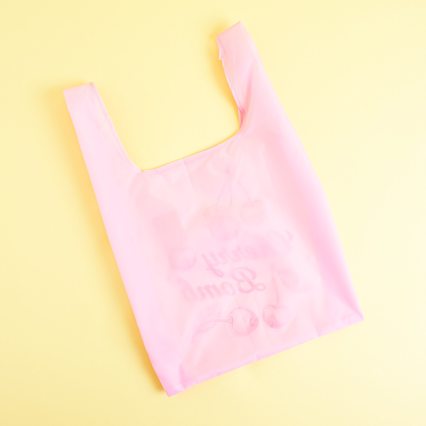 back of Pink Cherry Bomb reusable tote - blank