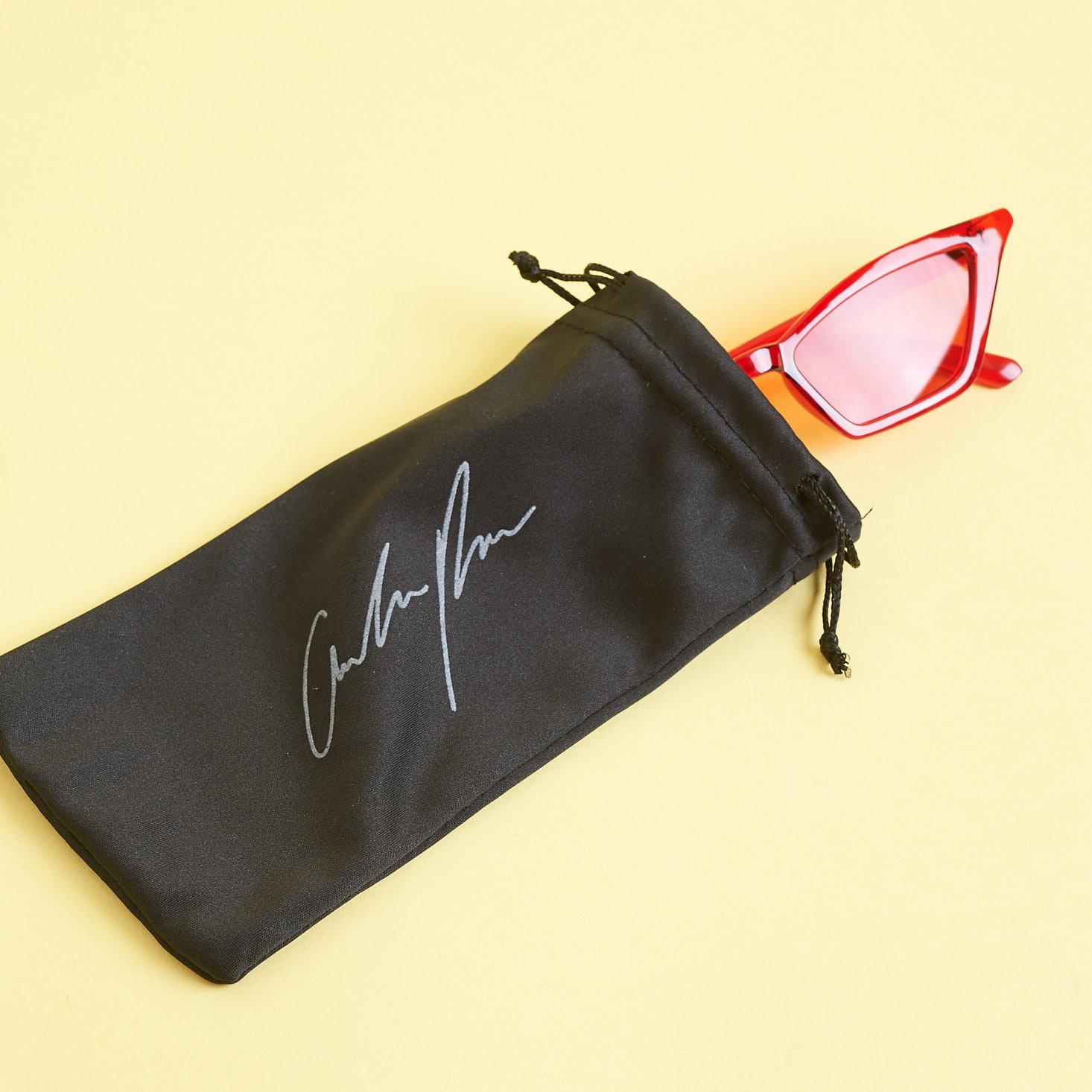 Amber Rose Sunglasses coming out of black pouch