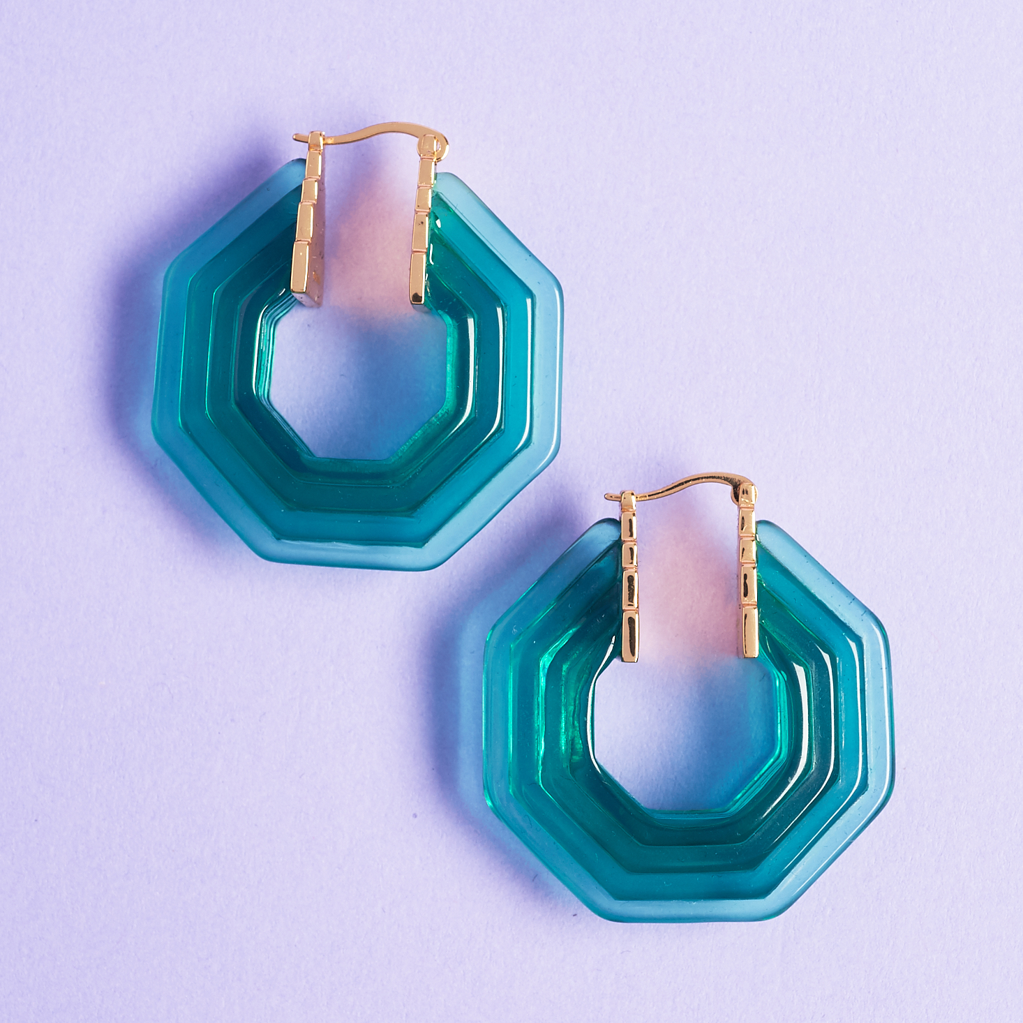 art deco inspired emerald lucite hoops with gold accents