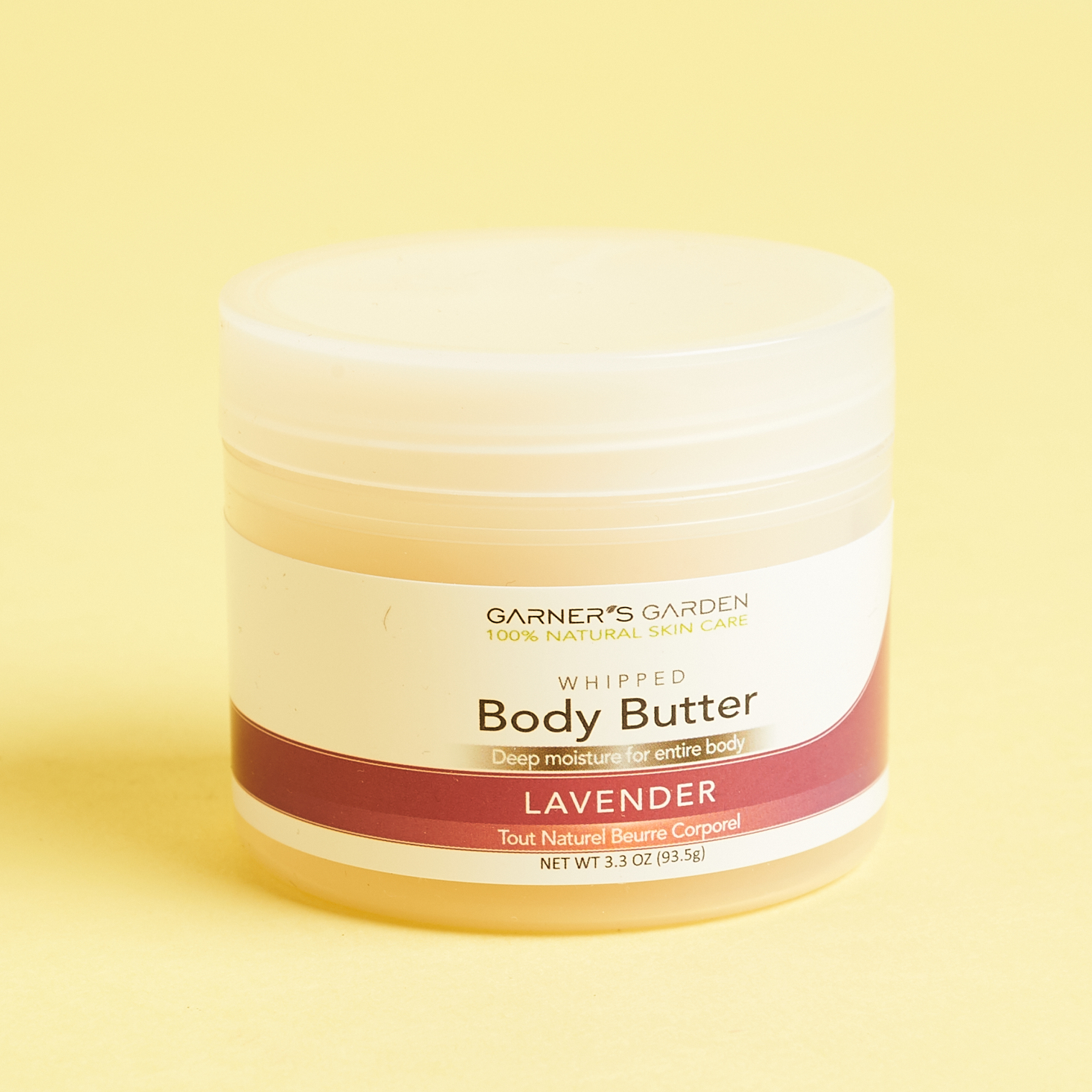 tub of levender body butter with white and purple label