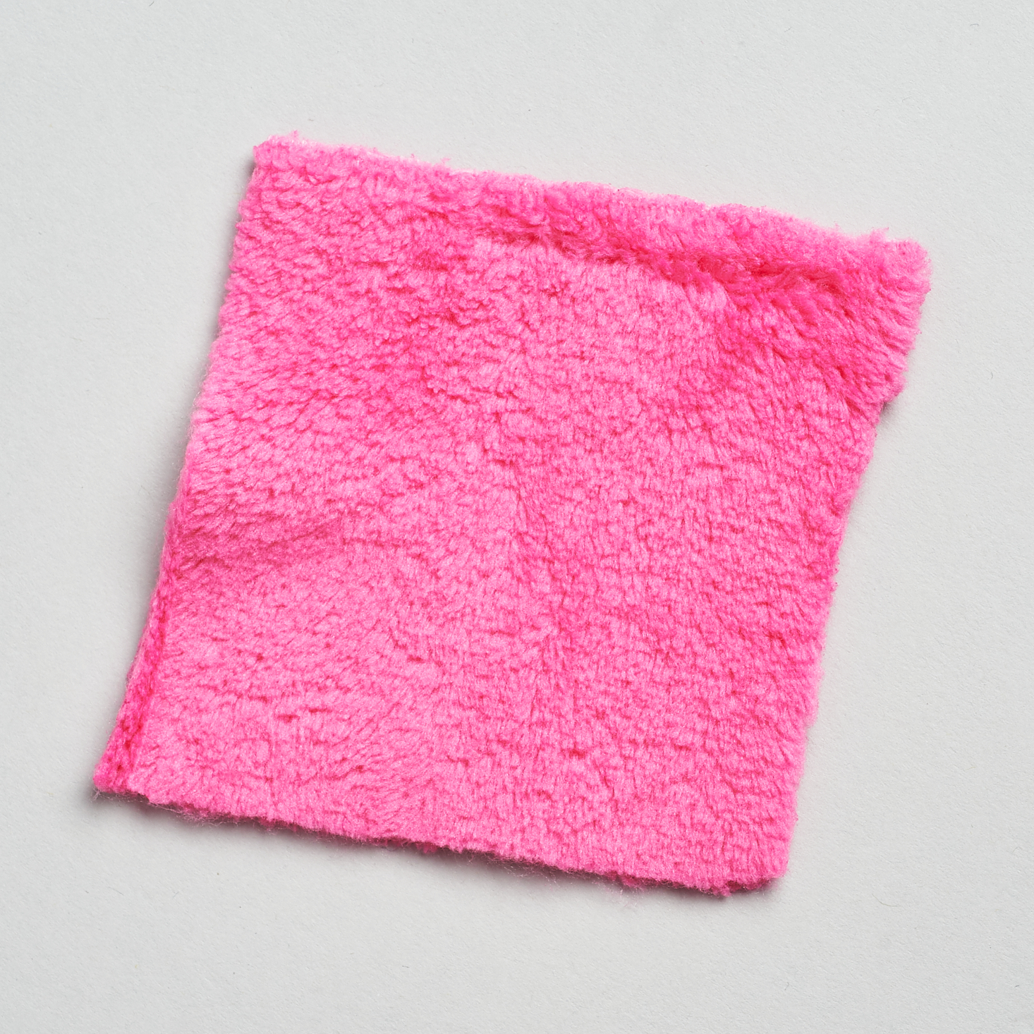 one side of pink makeup eraser sample