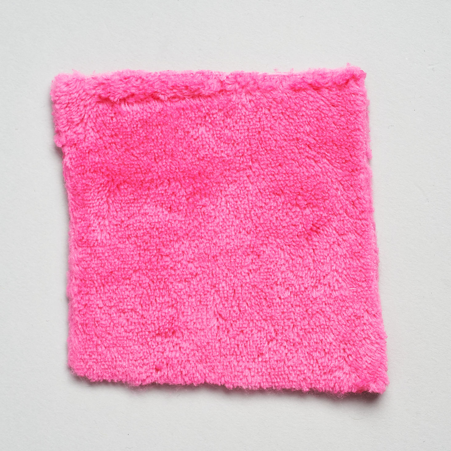 other side of pink makeup eraser sample