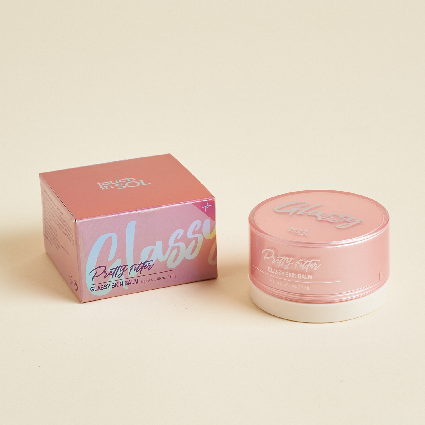 pink and white pot of skin balm