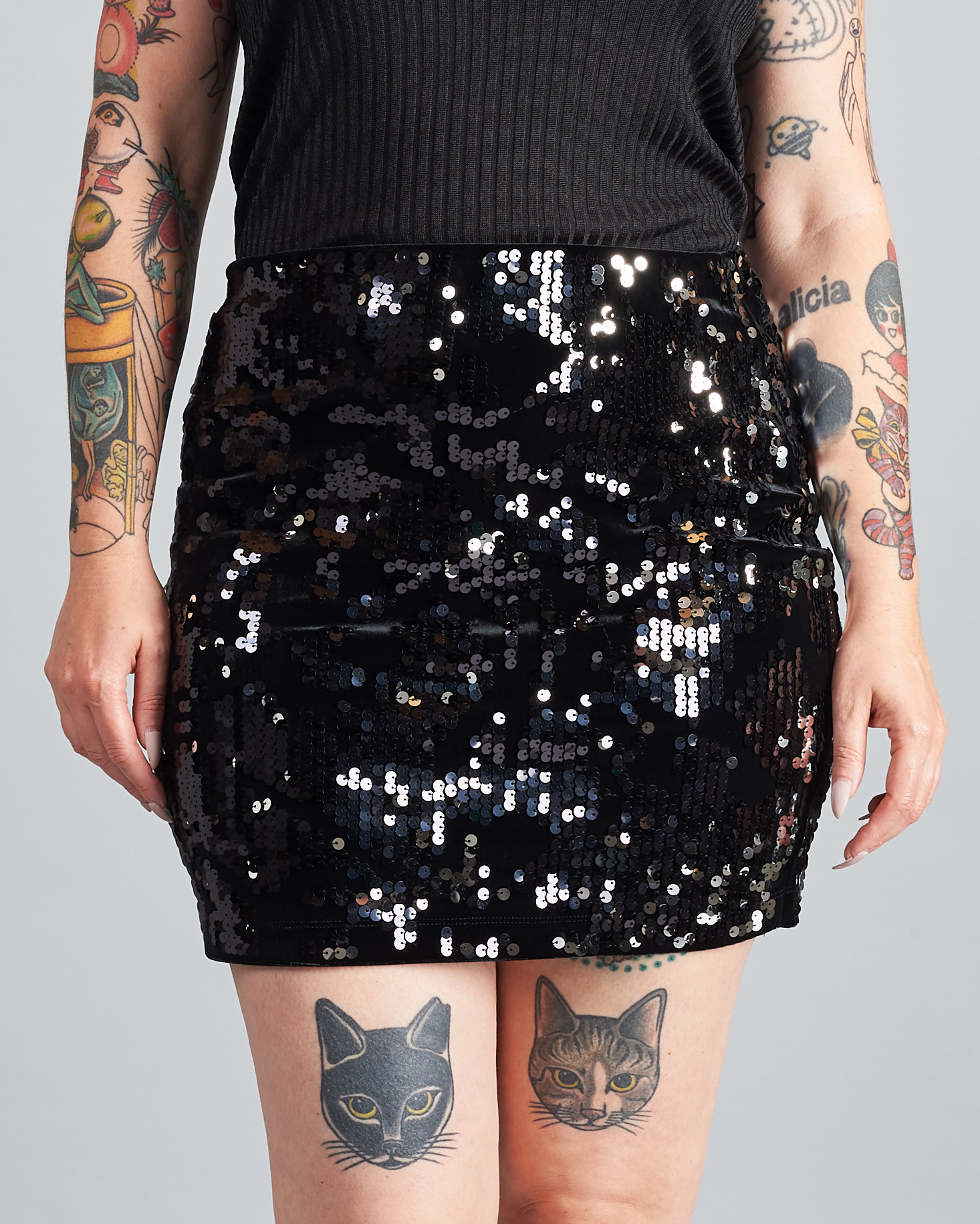 Marne in High Waisted Velvet Sequin Mini Skirt in Black and Fine Ribbed Cami in Black