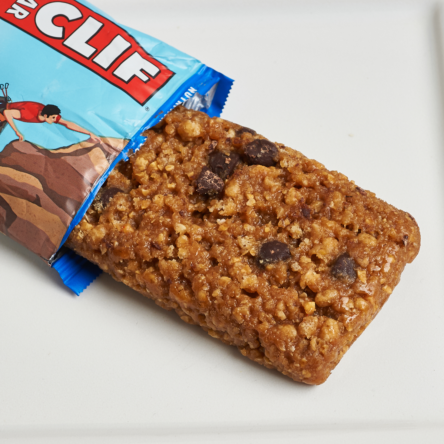 Choc chip Clif Bar coming out of package onto plate