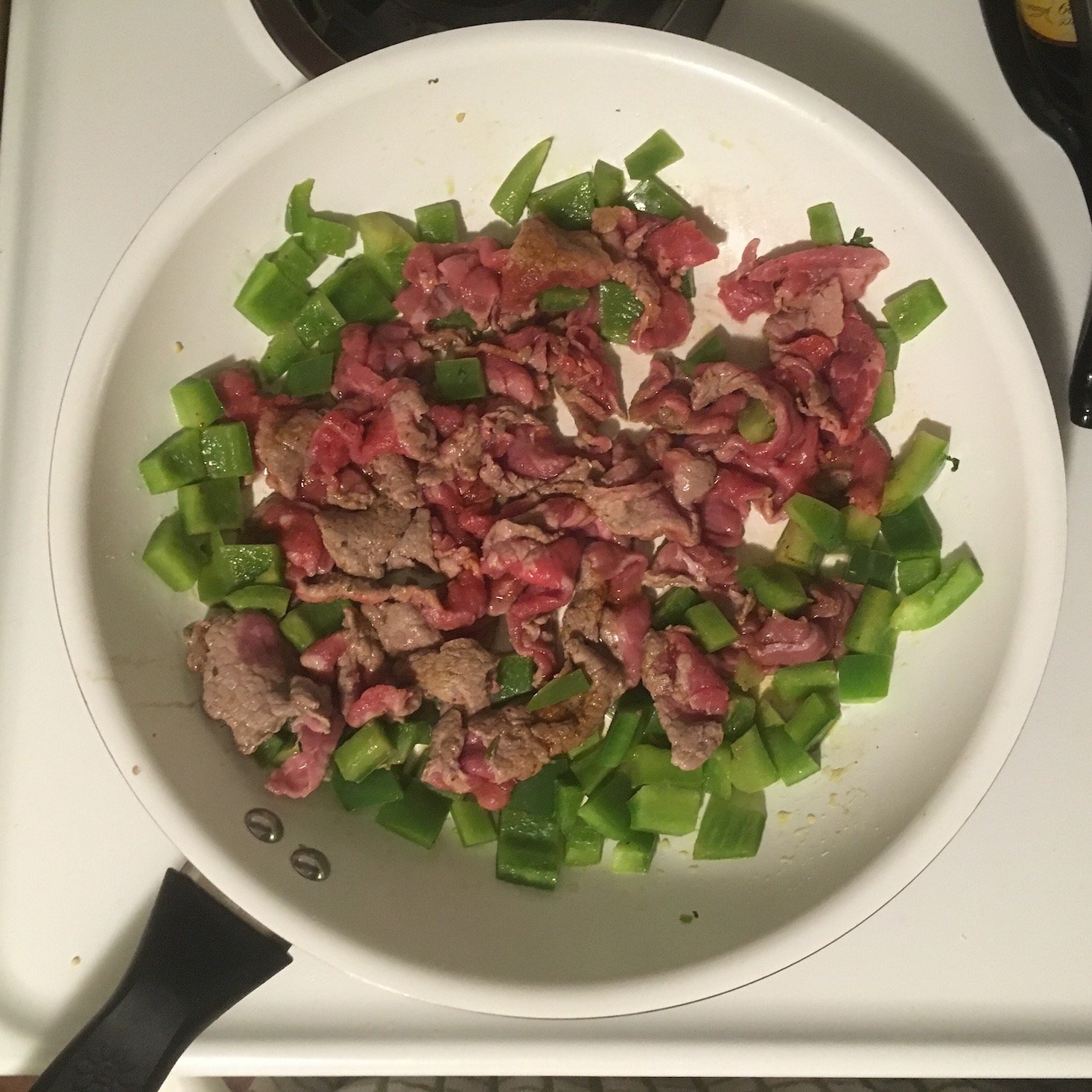 steak and rice bowls green peppers and beef in pan