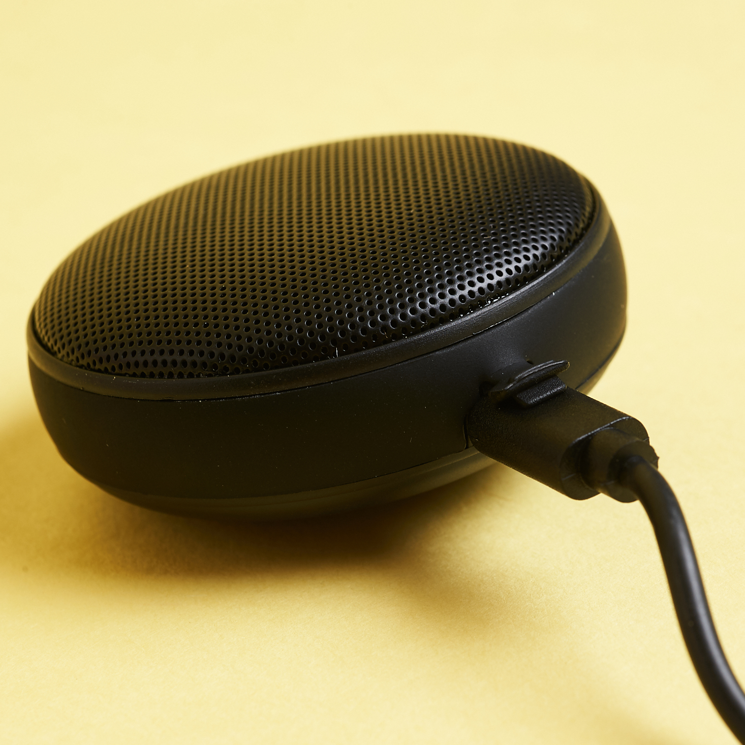 close up of chrager cord plugged into Speaqua Cruiser Wireless Speaker