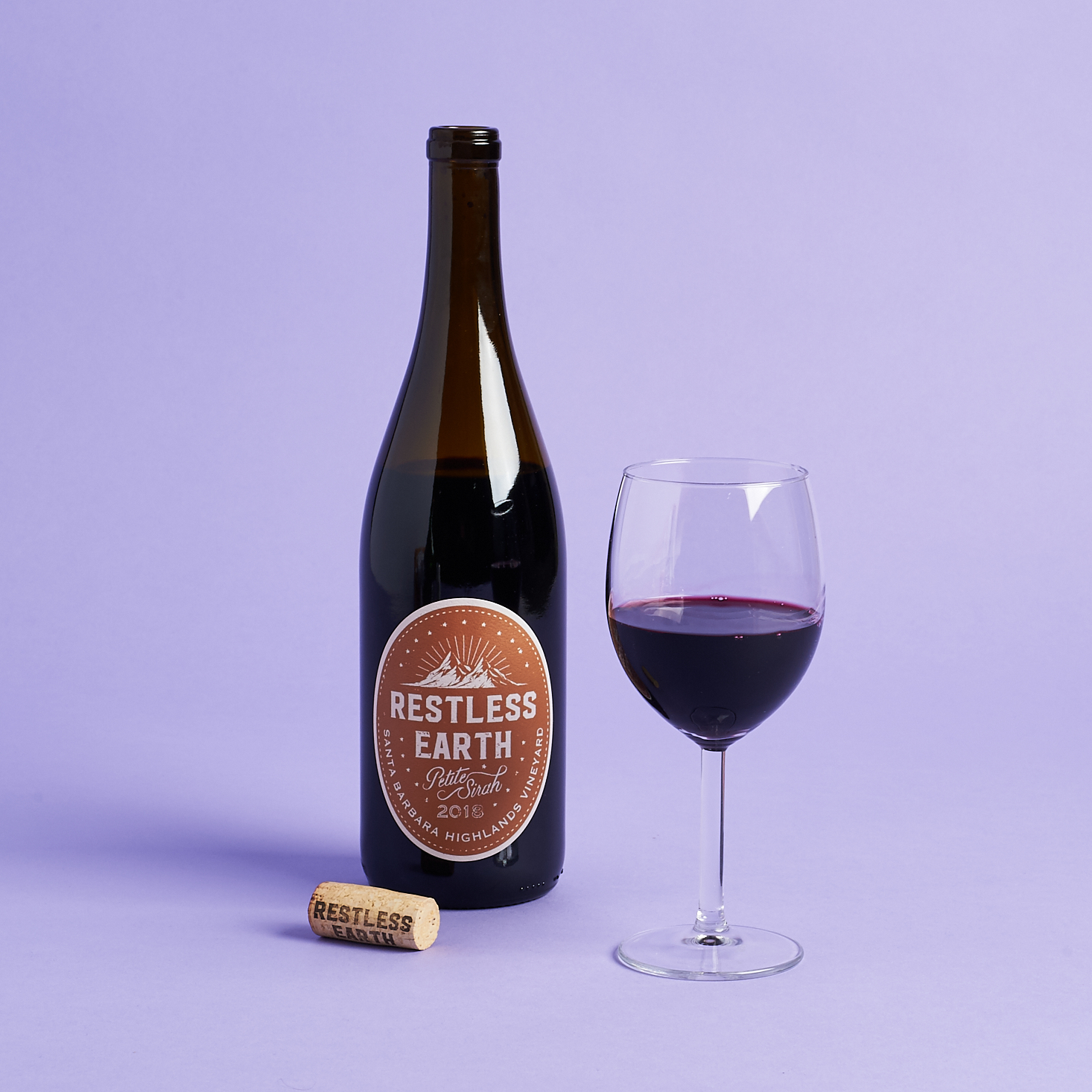 restless earth petite syrah bottle and glass