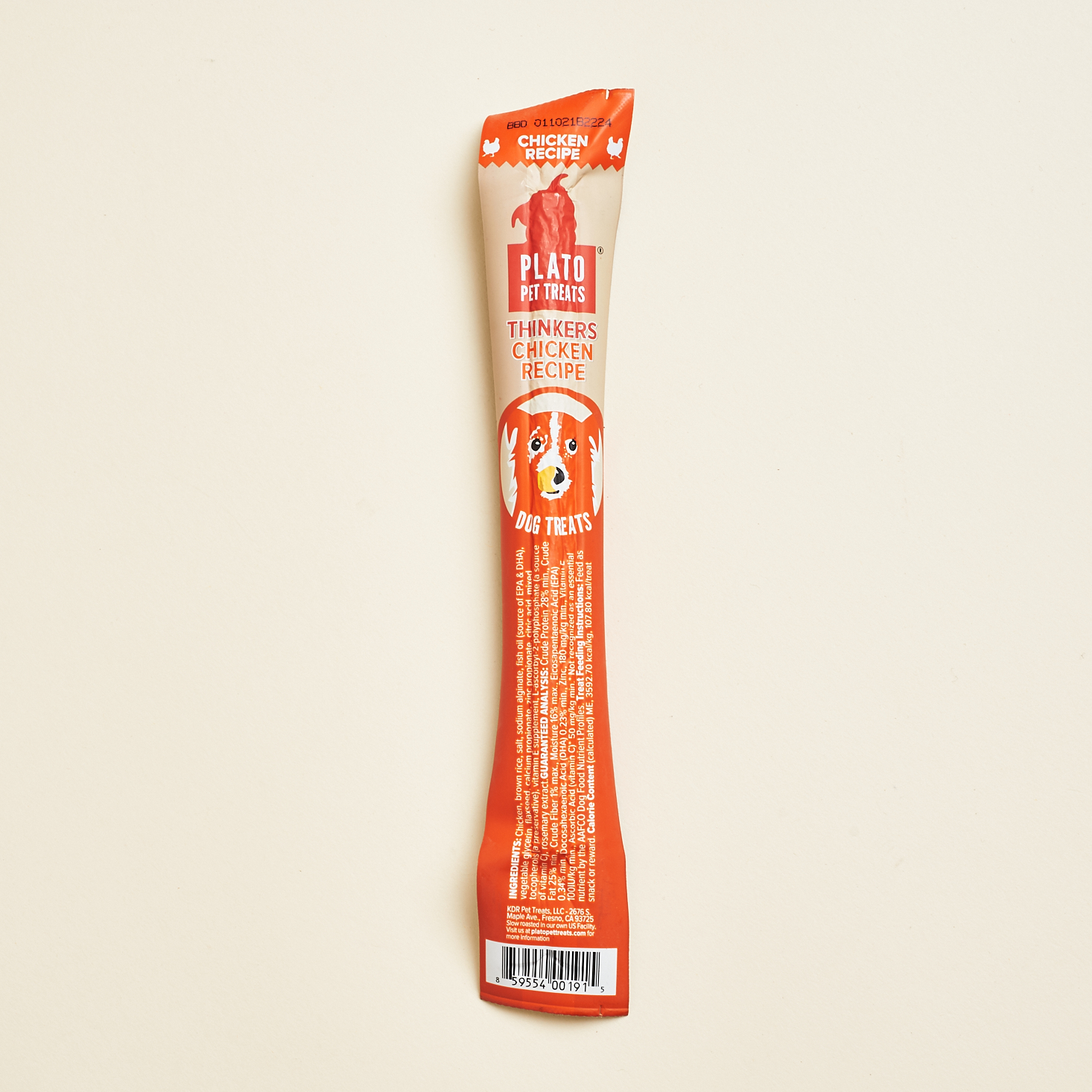 orange plastic wrapped chicken stick