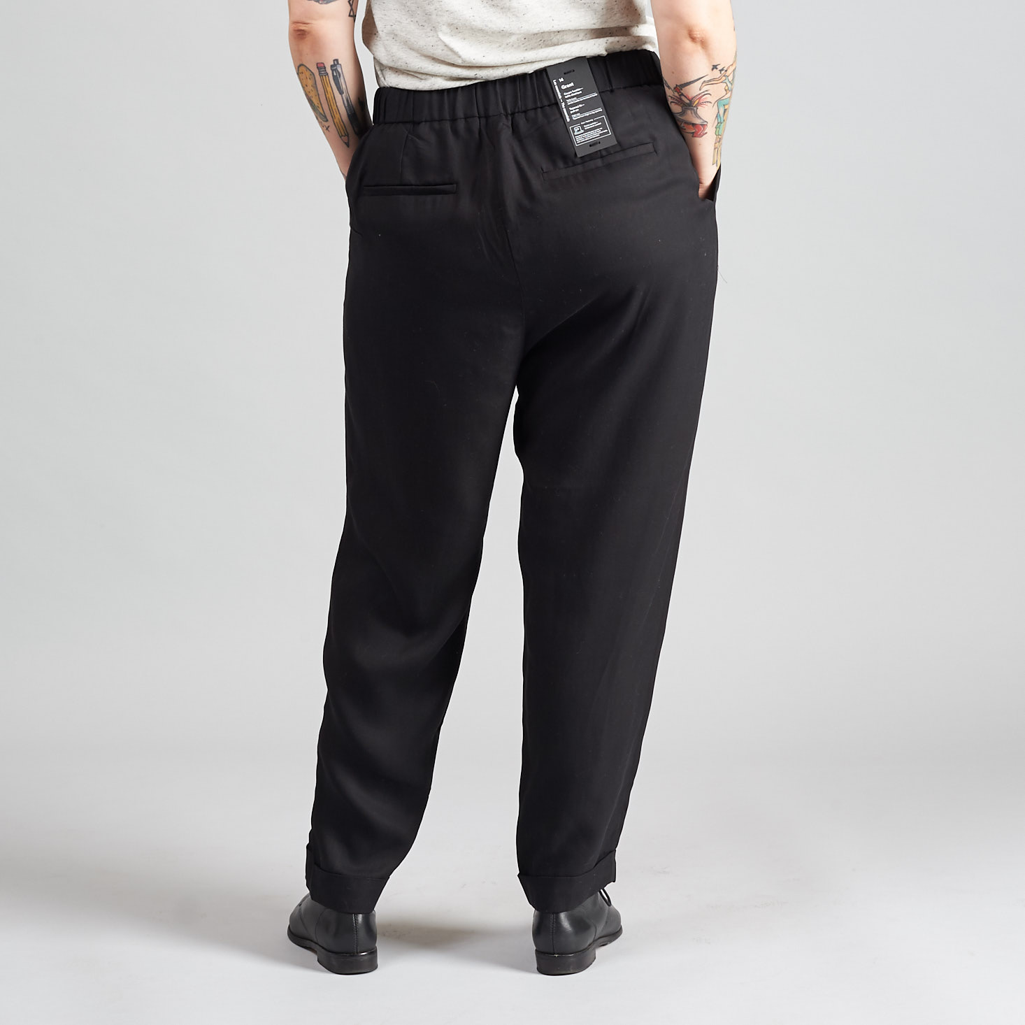 Marne wearing The Grant Pull-On Tapered Pant in Black - back