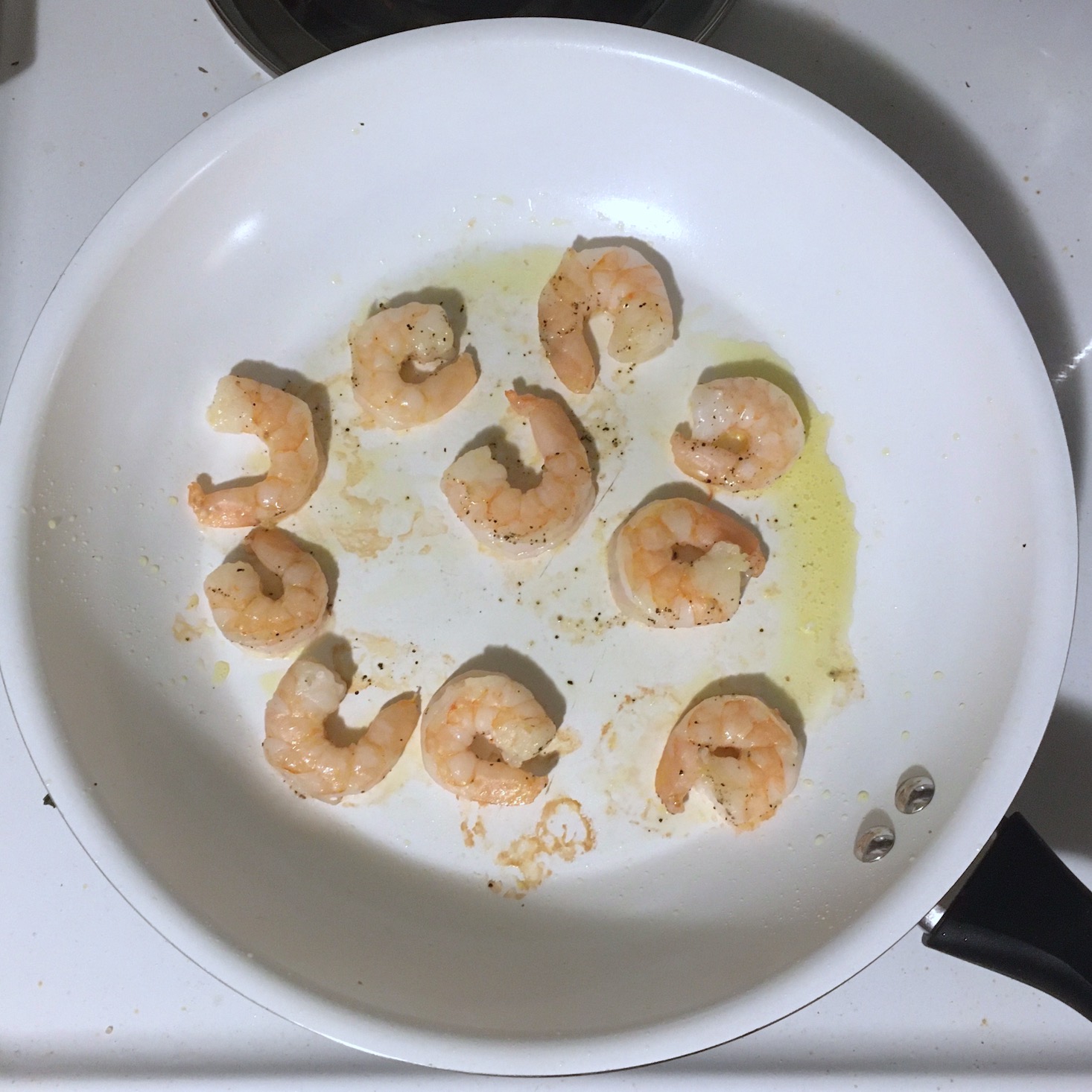 shrimp cooking in a pan