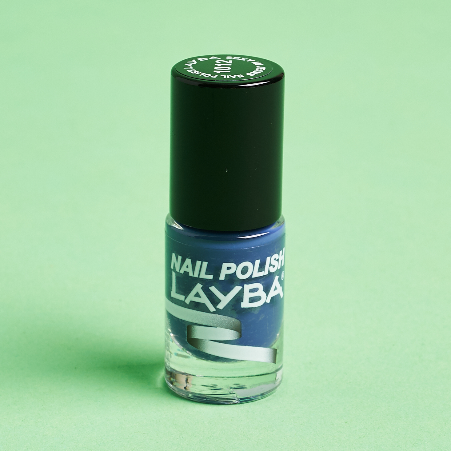 mini bottle of blue nail polish