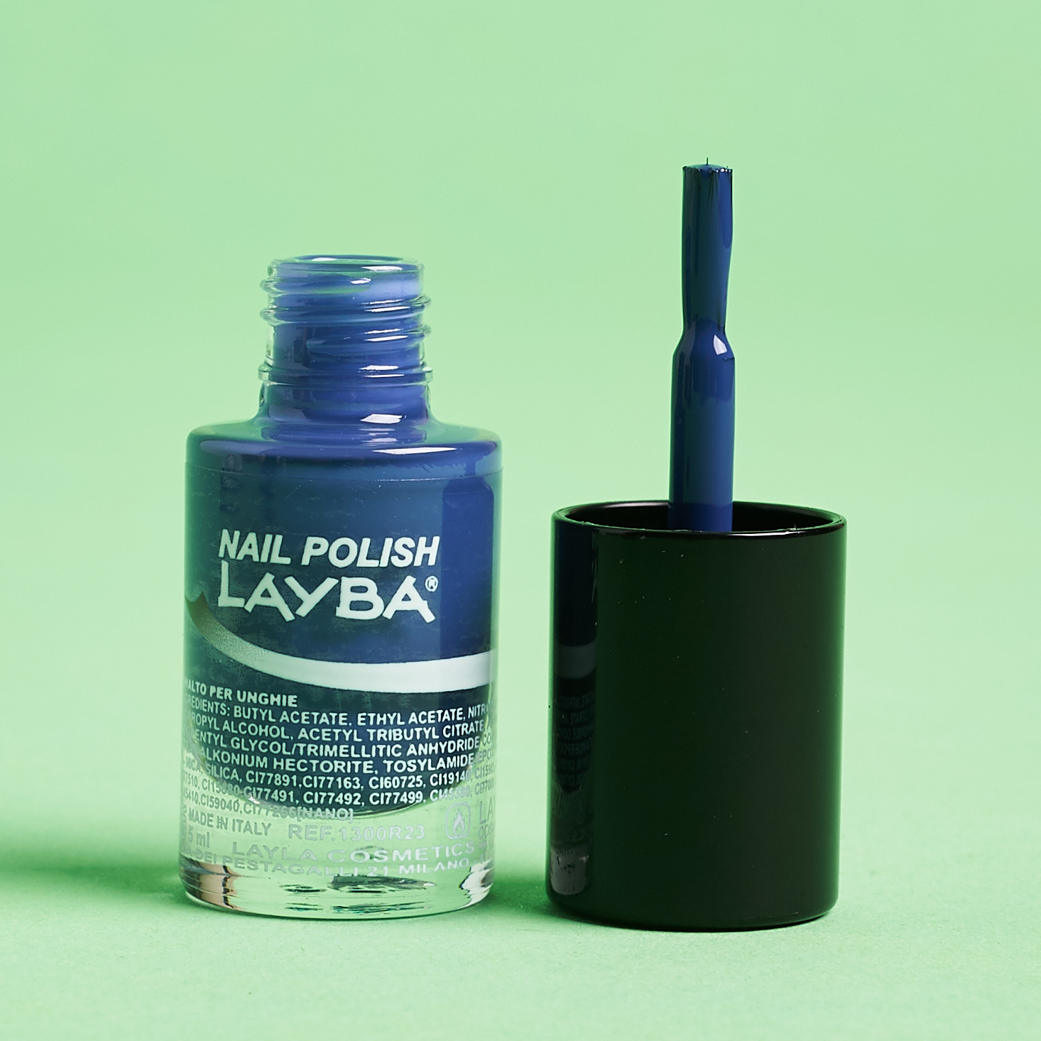 open polish bottle to show brush bristles