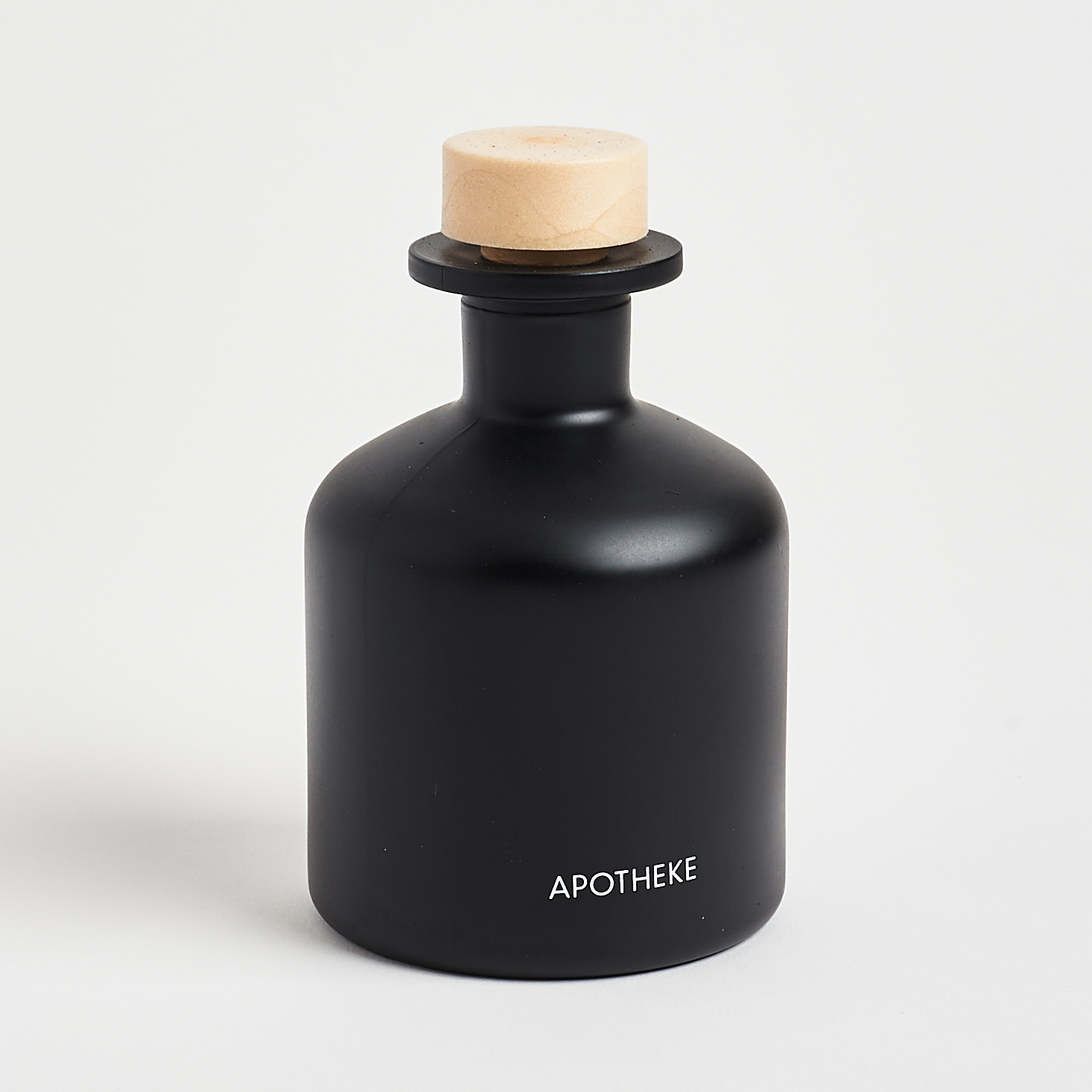 Apotheke Charcoal Diffuser bottle with cap on