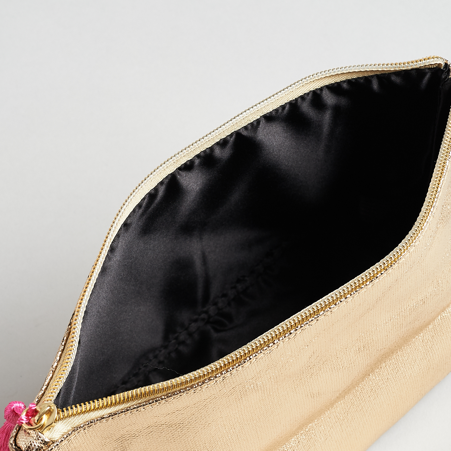 inside open Metallic Gold Makeup Bag with Tassels