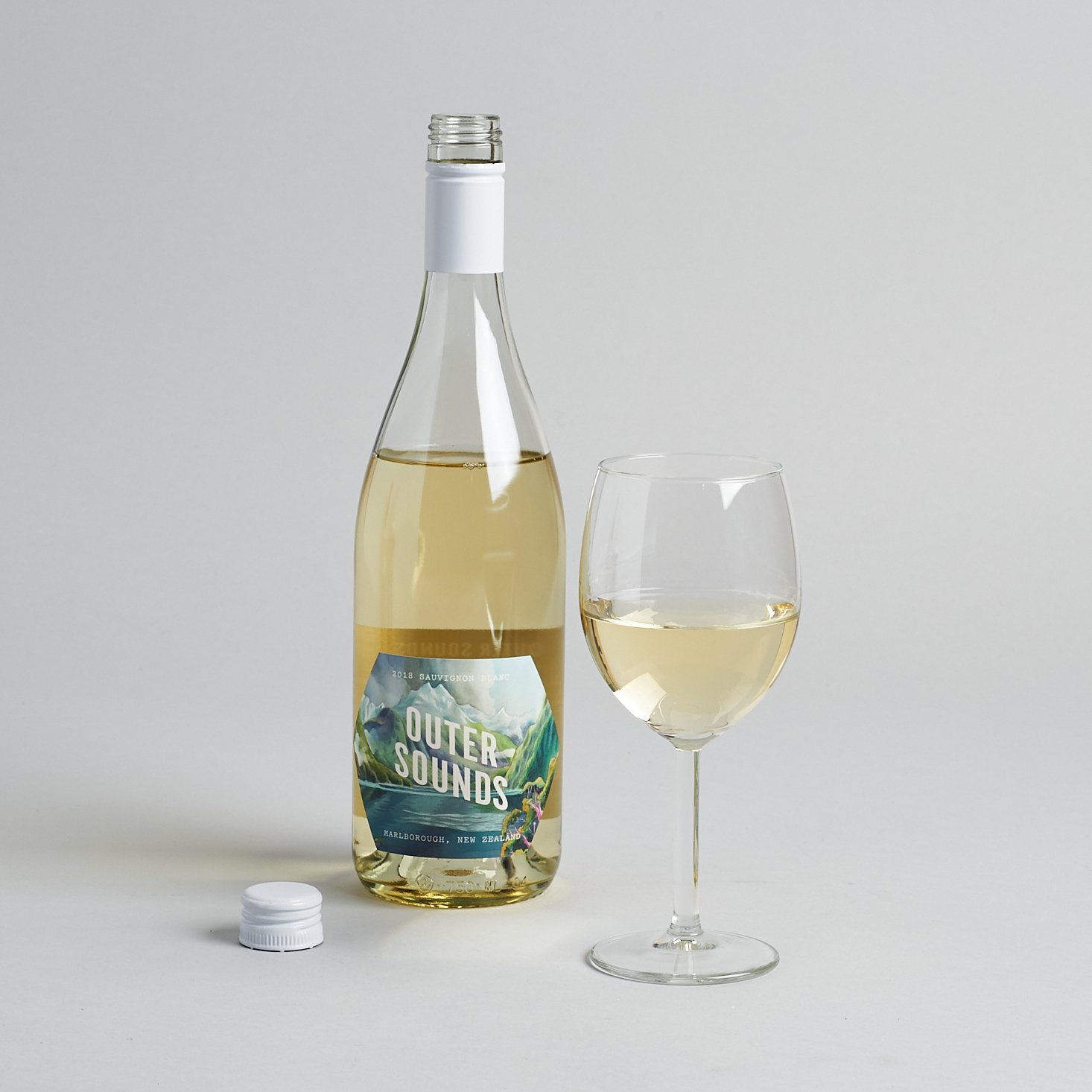 outer sounds sauvignon blanc bottle and glass