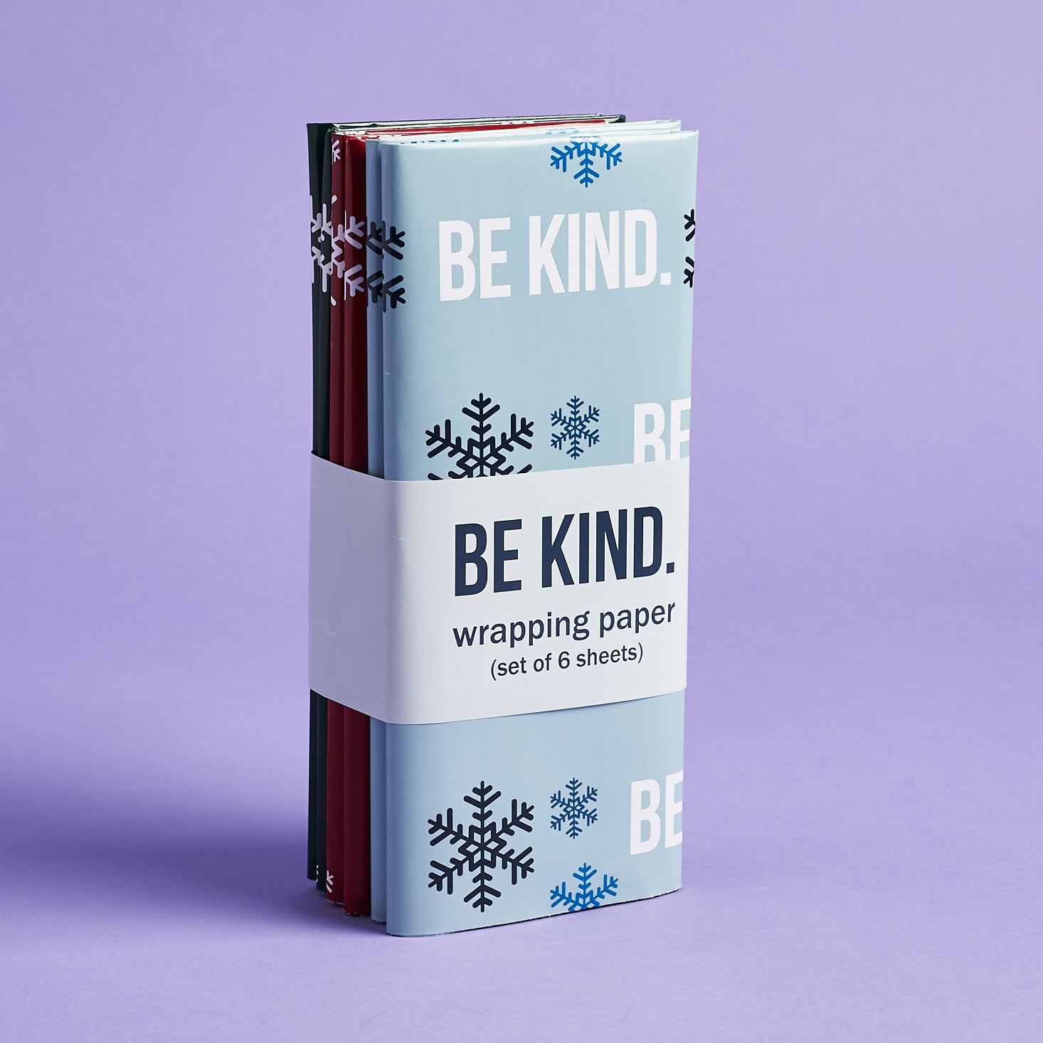 pack of be kind themed wrapping paper